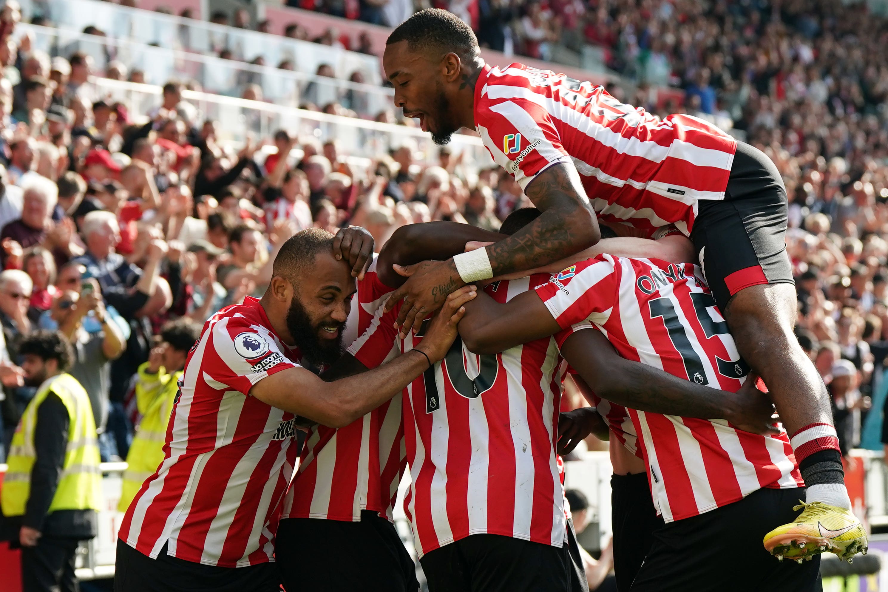 Josh Dasilva is mobbed by his Brentford team-mates (Nick Potts/PA)