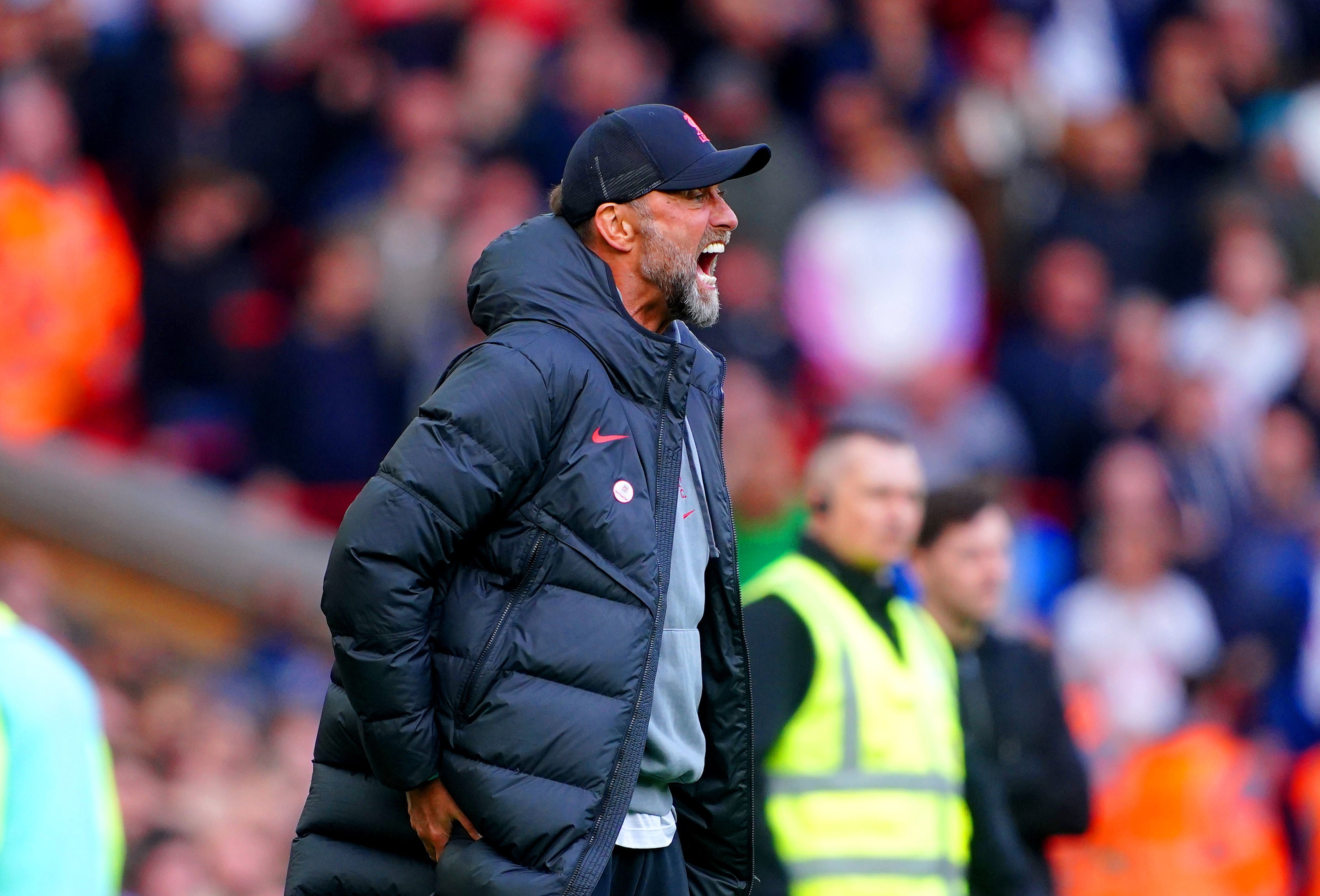 Jurgen Klopp appears to clutch his hamstring after the final whistle