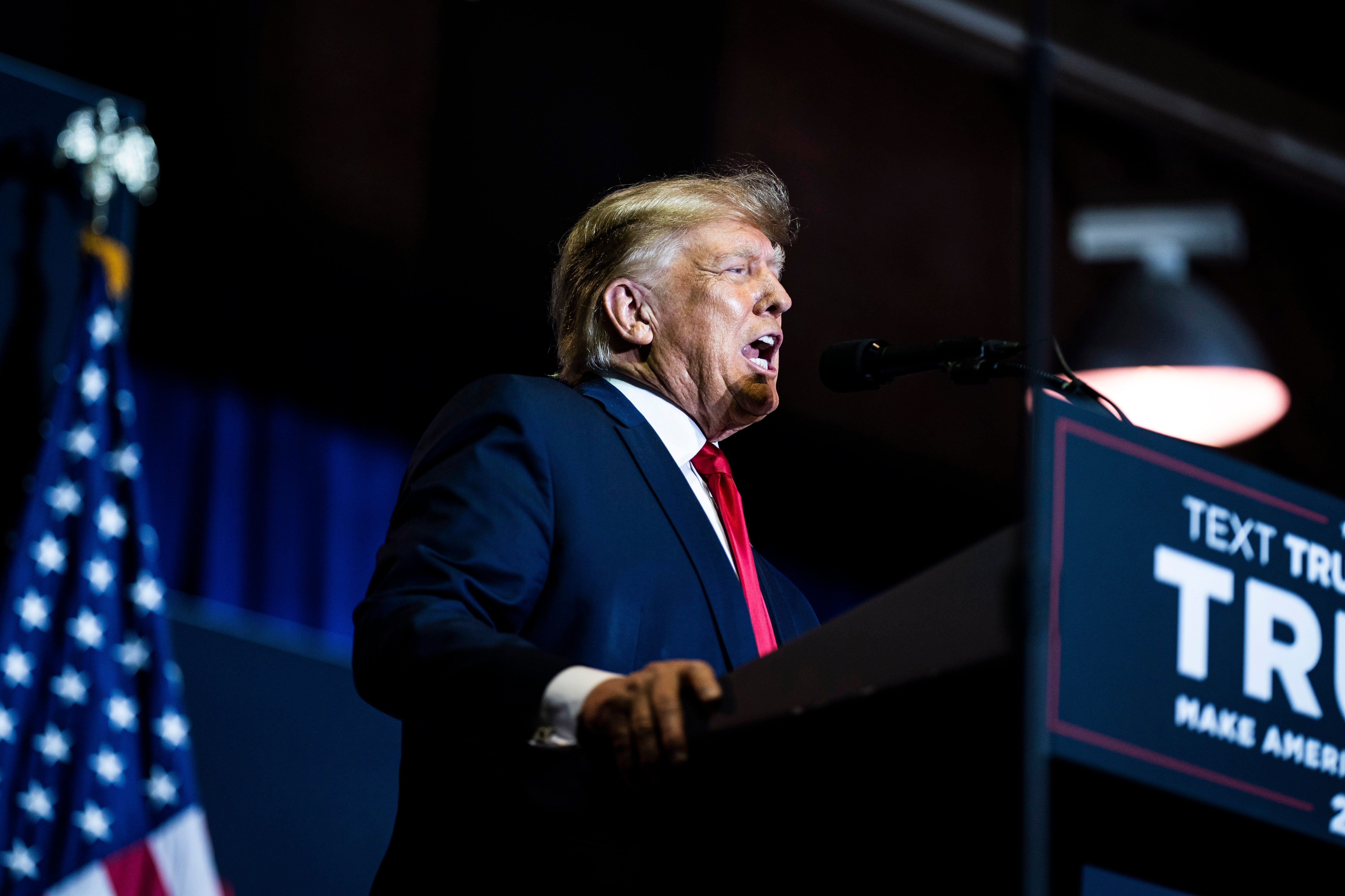 Former president Donald Trump speaks at a campaign event in Manchester, New Hampshire