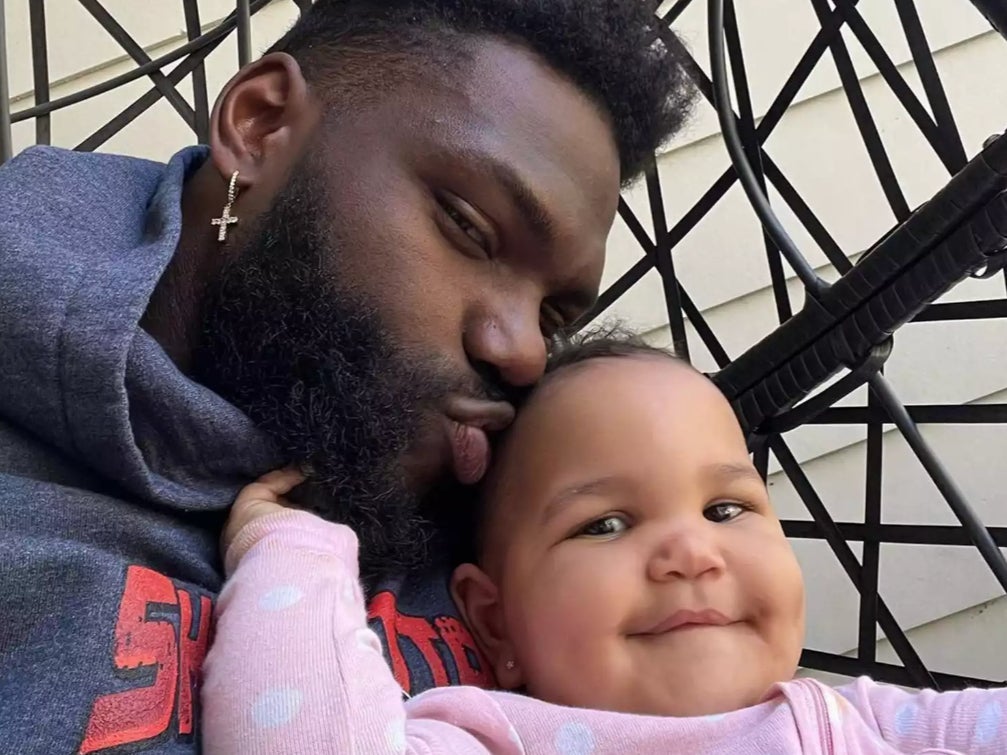 Shaquil Barrett and his daughter