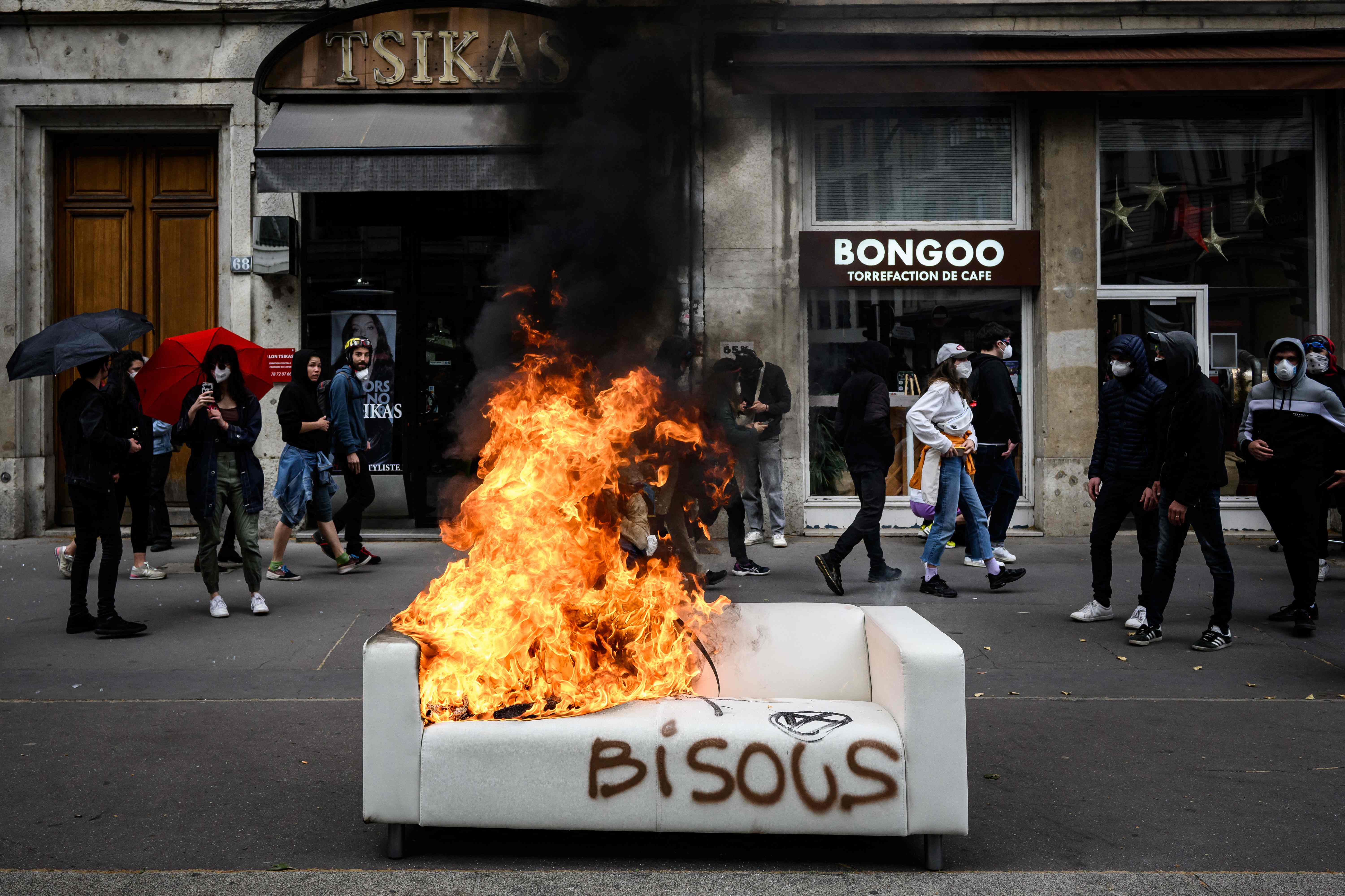 Protesters in Lyon after a fire was set