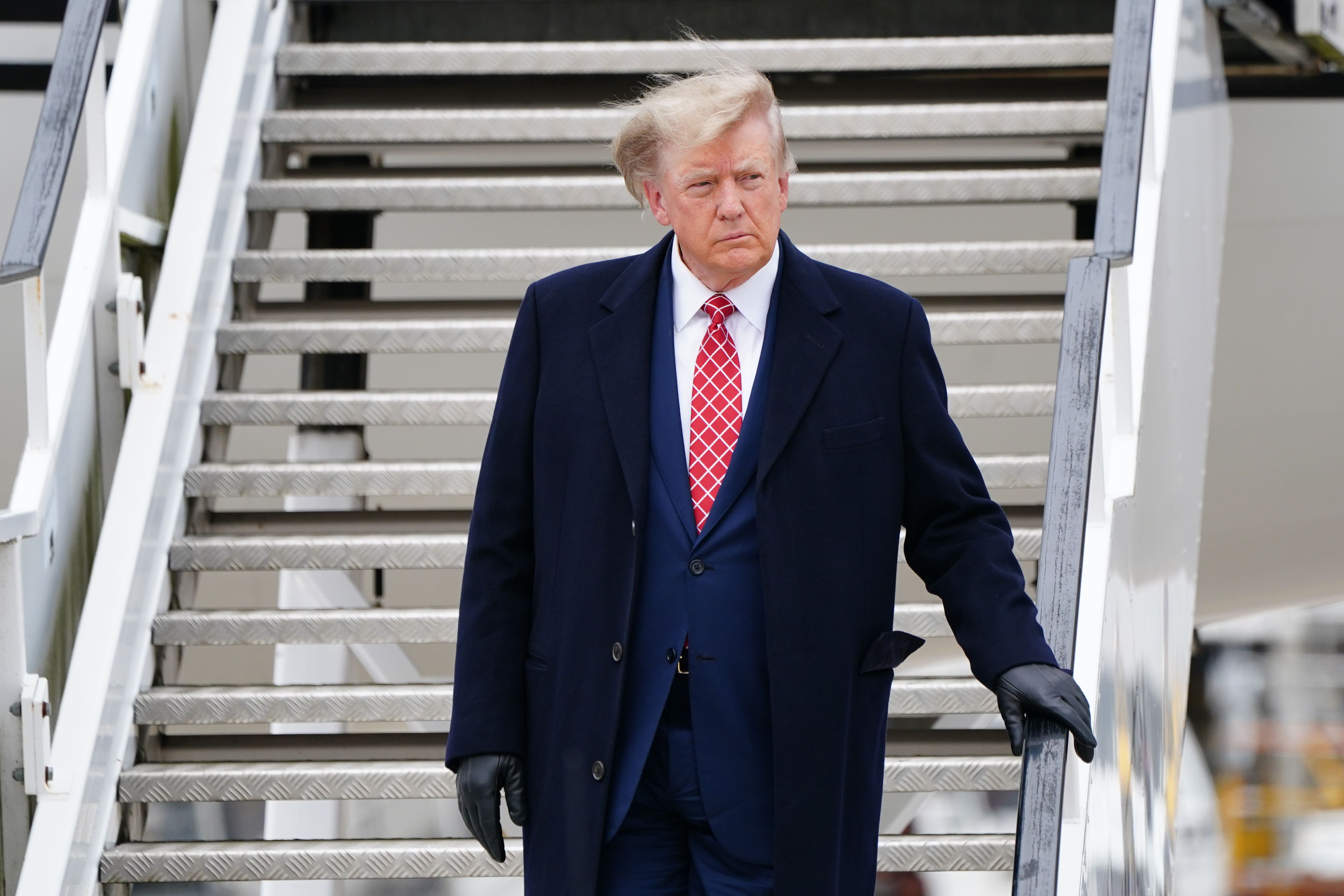 Former US president Donald Trump arrives in his private jet at Aberdeen Airport (Jane Barlow/PA)