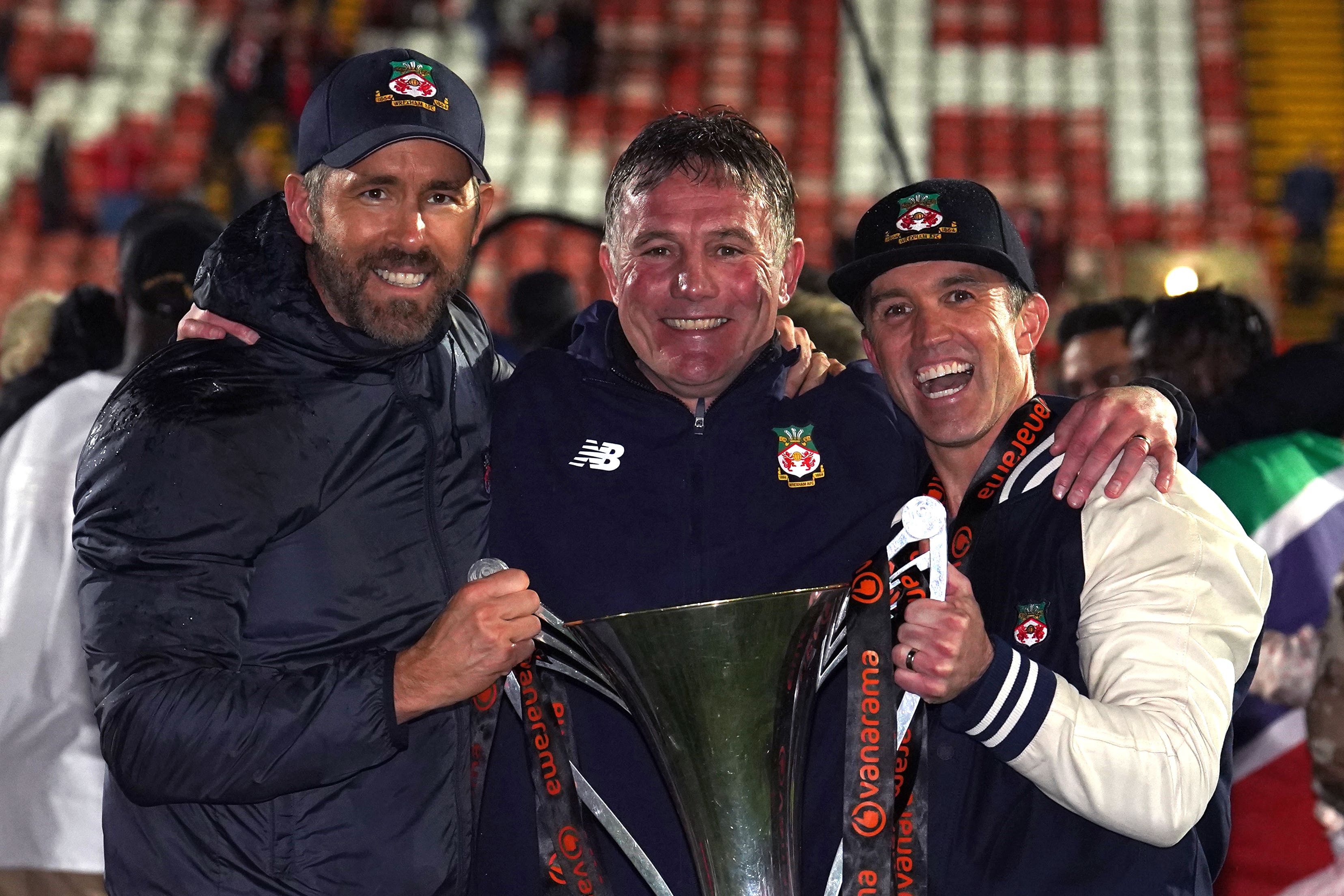 Wrexham manager Phil Parkinson (centre) is already planning for next season (Martin Rickett/PA)