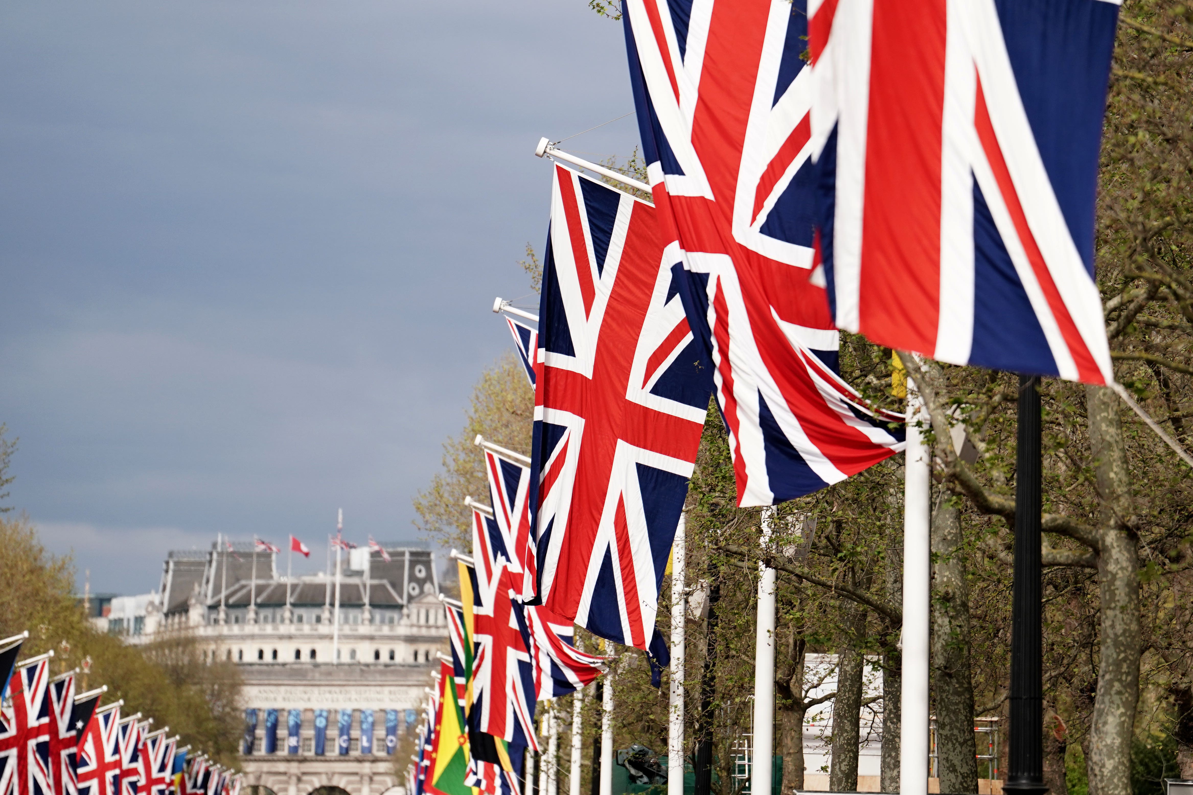 Pall Mall leading up to Buckingham Palace is already buzzing with excitement as people set up tents