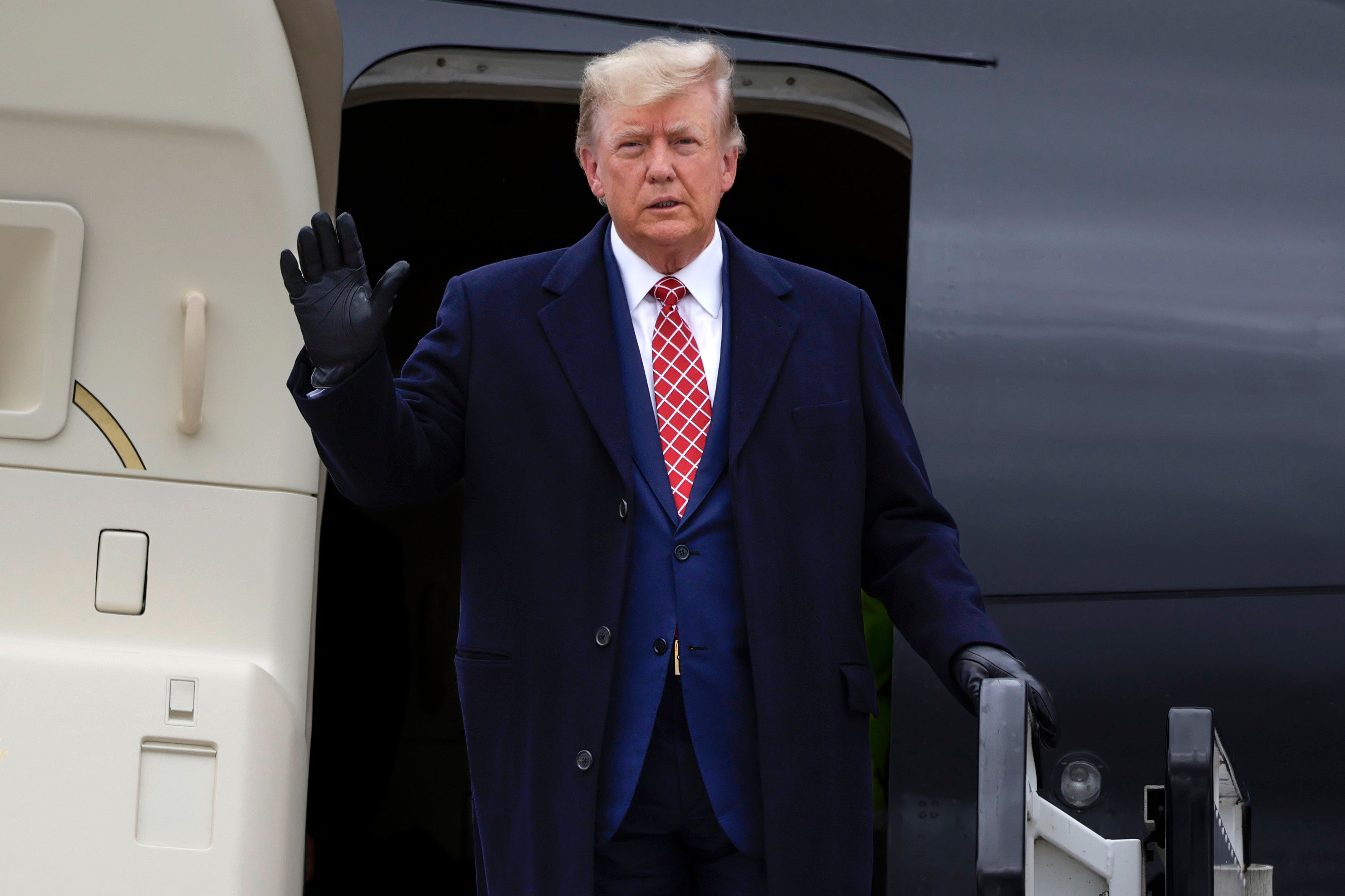 Former US president Donald Trump disembarks his plane ‘Trump Force One’ at Aberdeen Airport