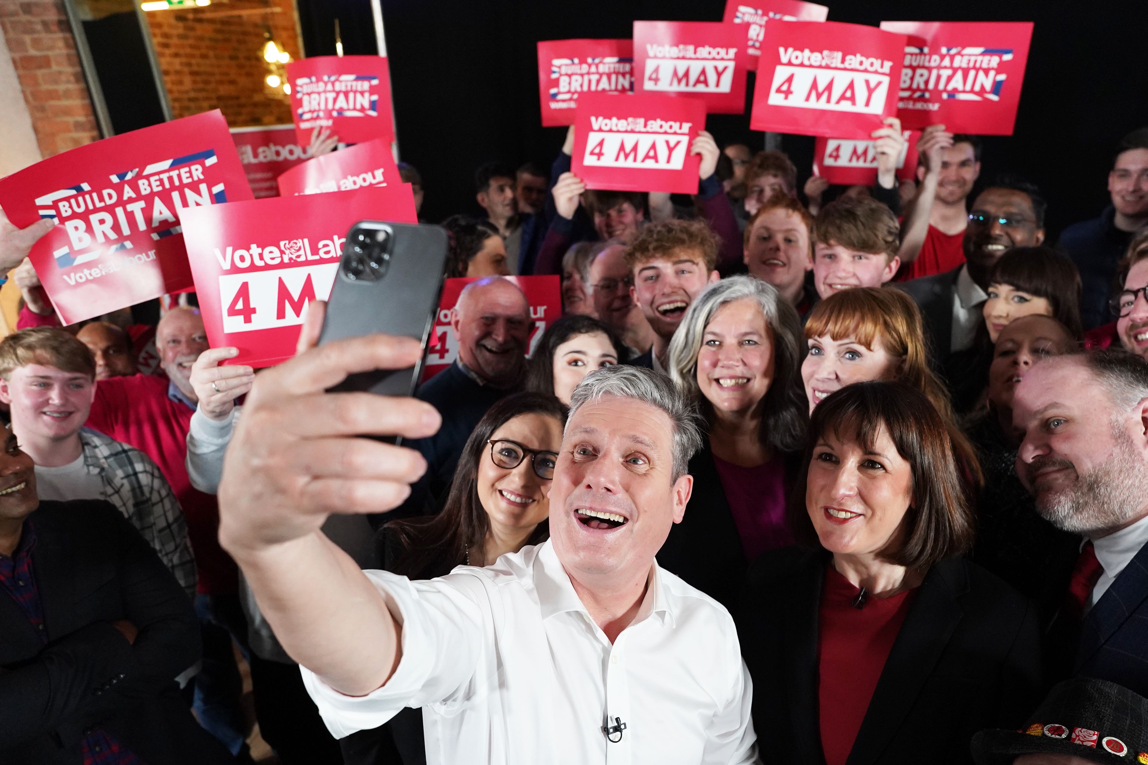 Labour leader Sir Keir Starmer (centre) has faced criticism as he moves the party away from a promise to scrap tuition fees (Stefan Rousseau/PA)