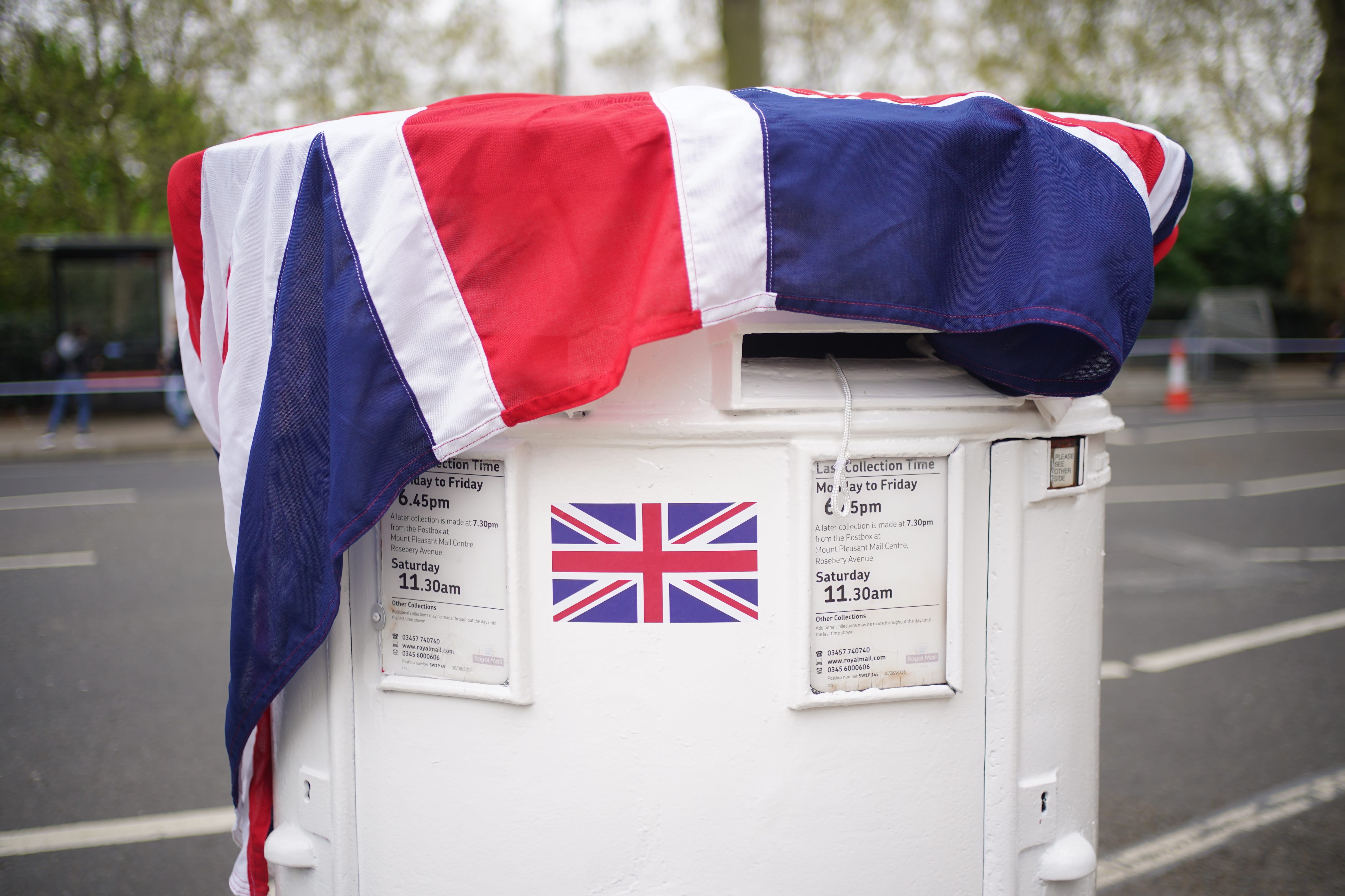 A post box in Westminster decorated to mark the King’s coronation (Yui Mok/PA)