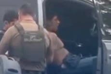 Texas shooting suspect found hiding in closet under laundry days after five killed over noise complaint