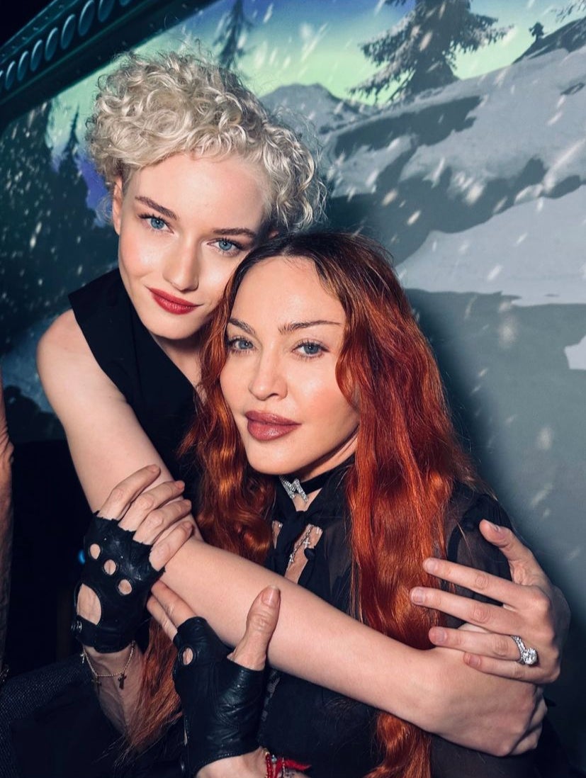 Madonna (right) and Julia Garner