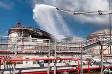 Huge fire rages at oil depot behind Russian lines