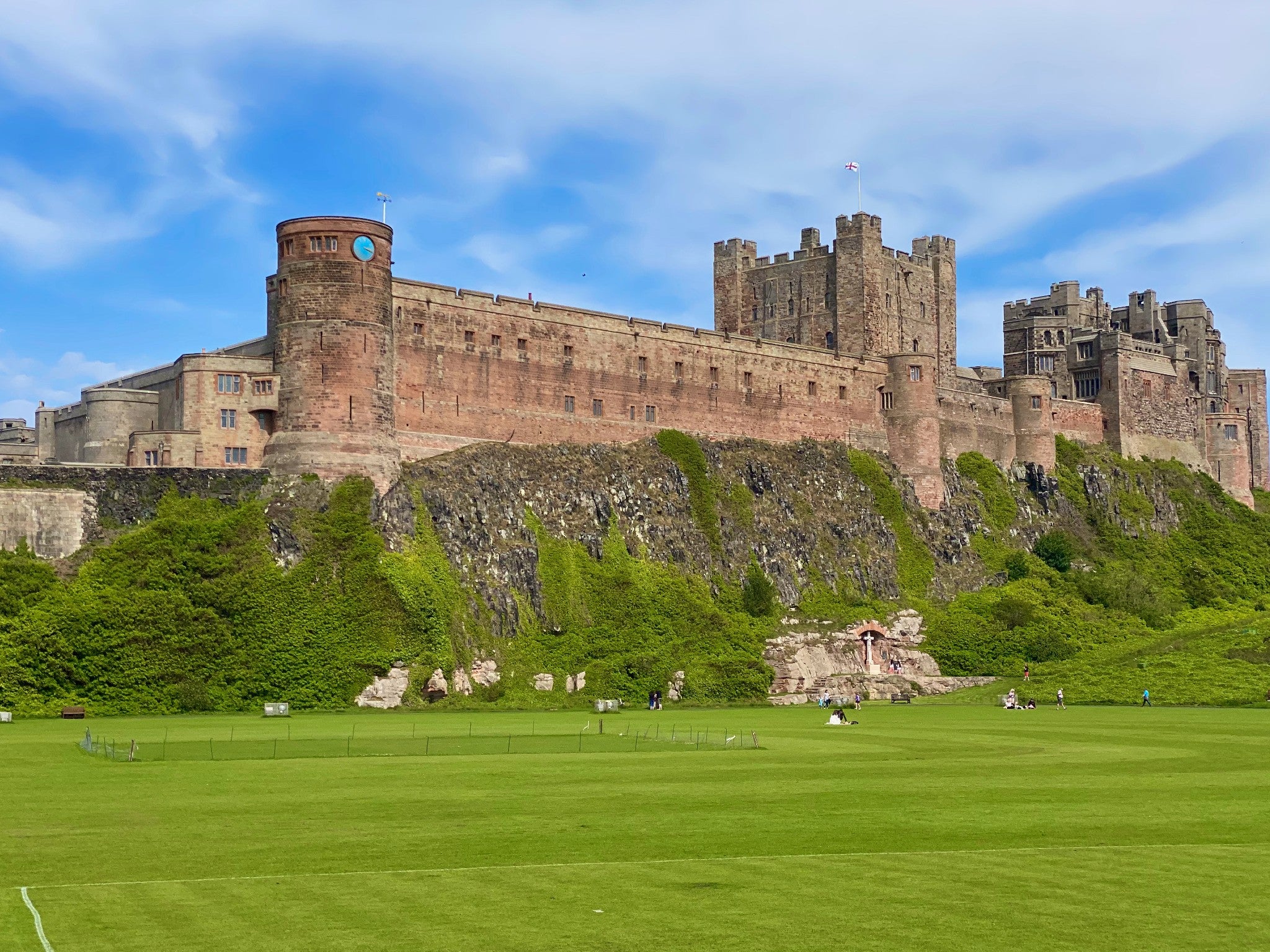 Bamburgh Castle overlooks the beach, cricket green and main street