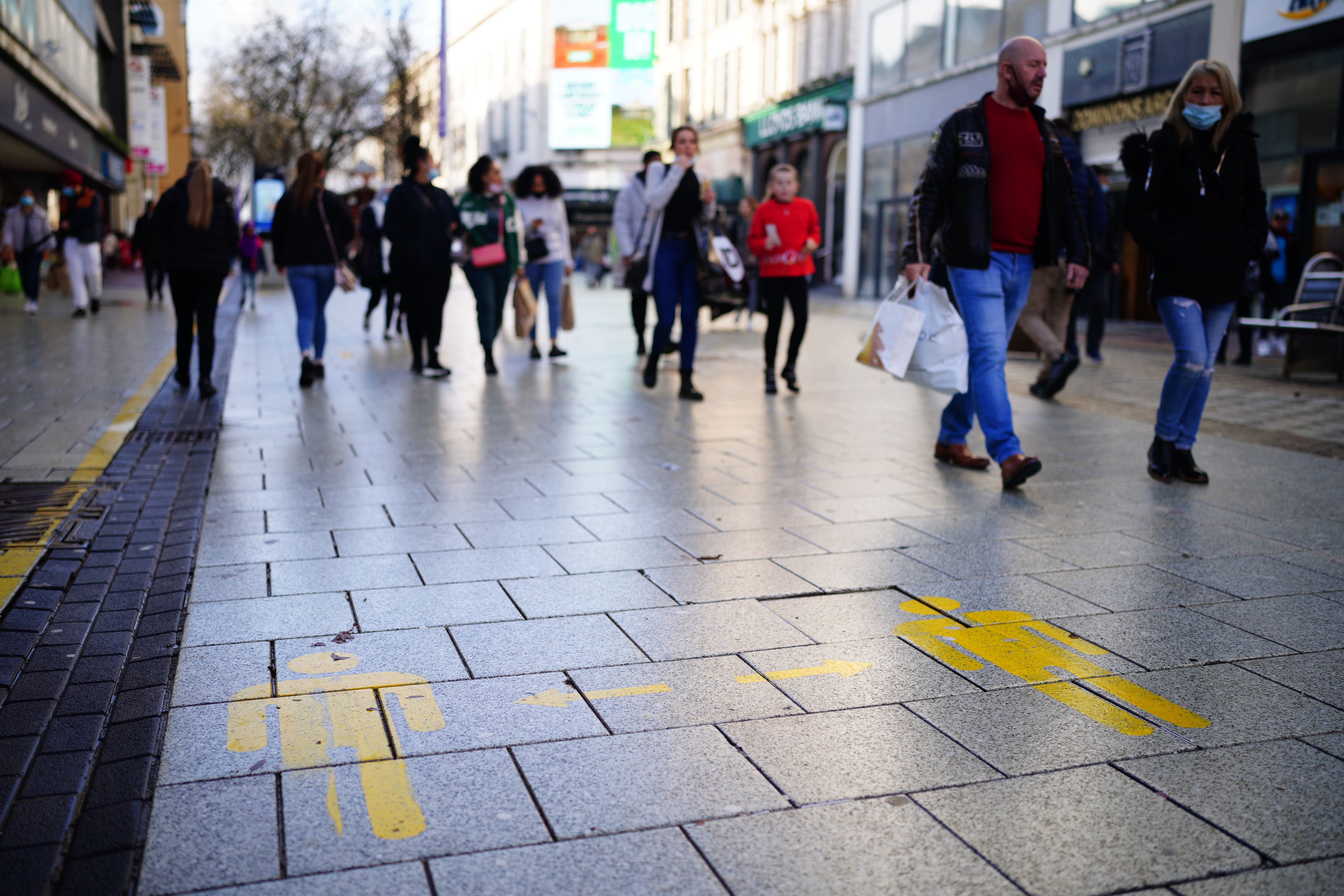 Shoppers during coronavirus restrictions in Wales in 2021 (Ben Birchall/PA)