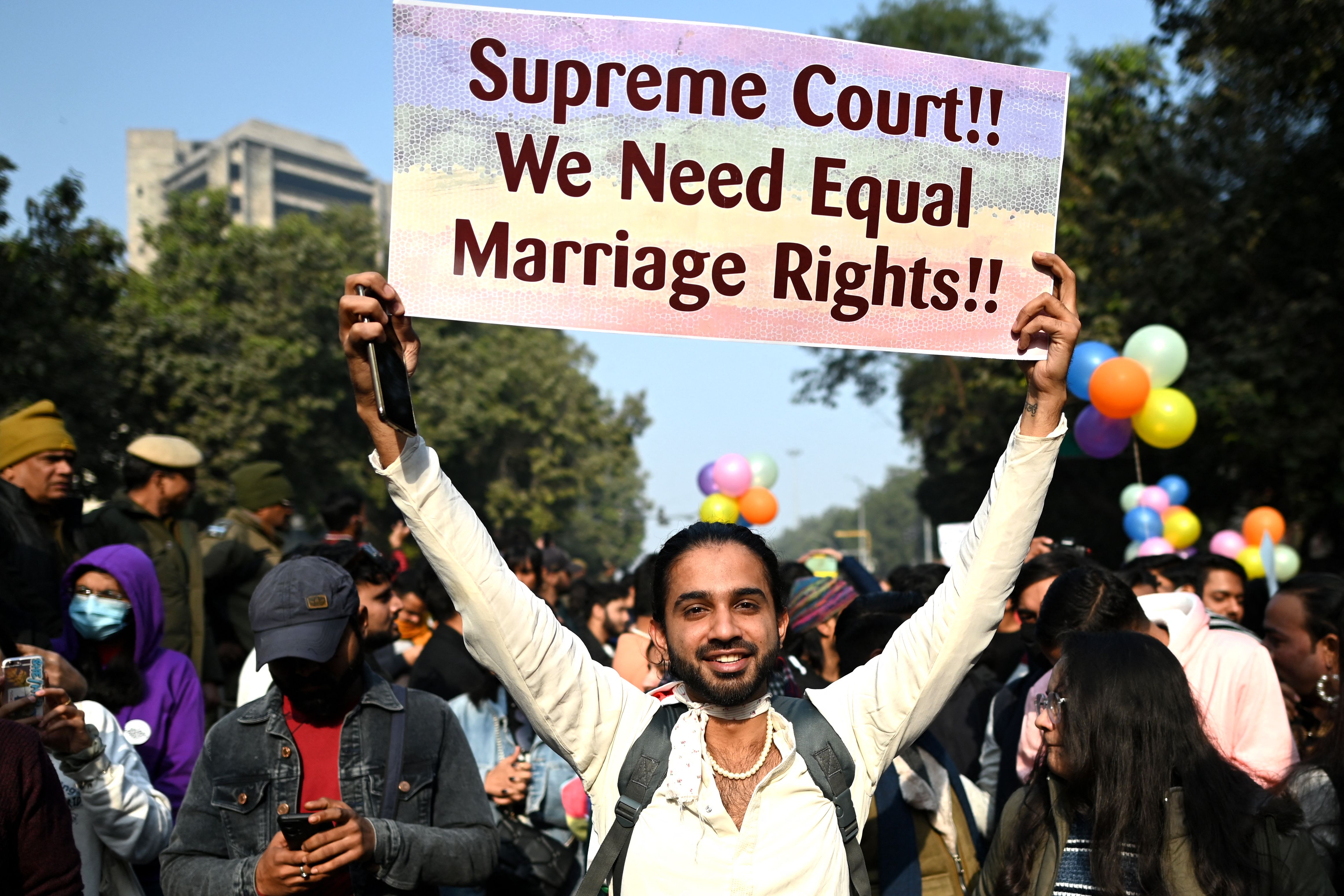 Gender rights activists and supporters of LGBTQ community walk the Delhi queer pride parade in New Delhi