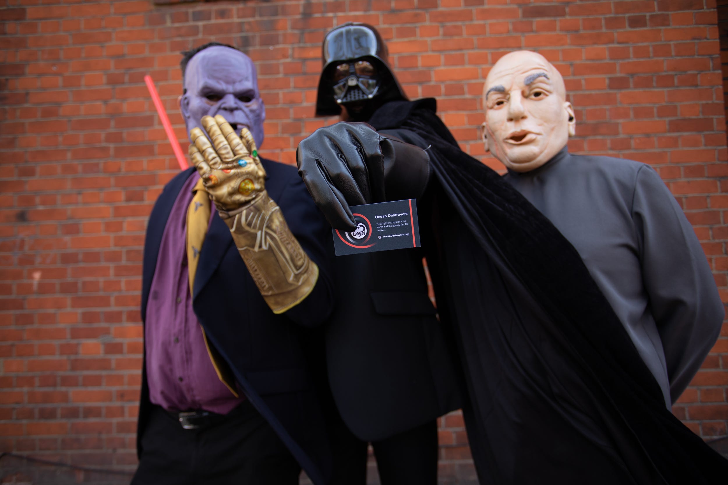 Actors dressed as Darth Vader, Dr Evil and Thanos attend the deep sea mining summit in central London (Greenpeace/PA)