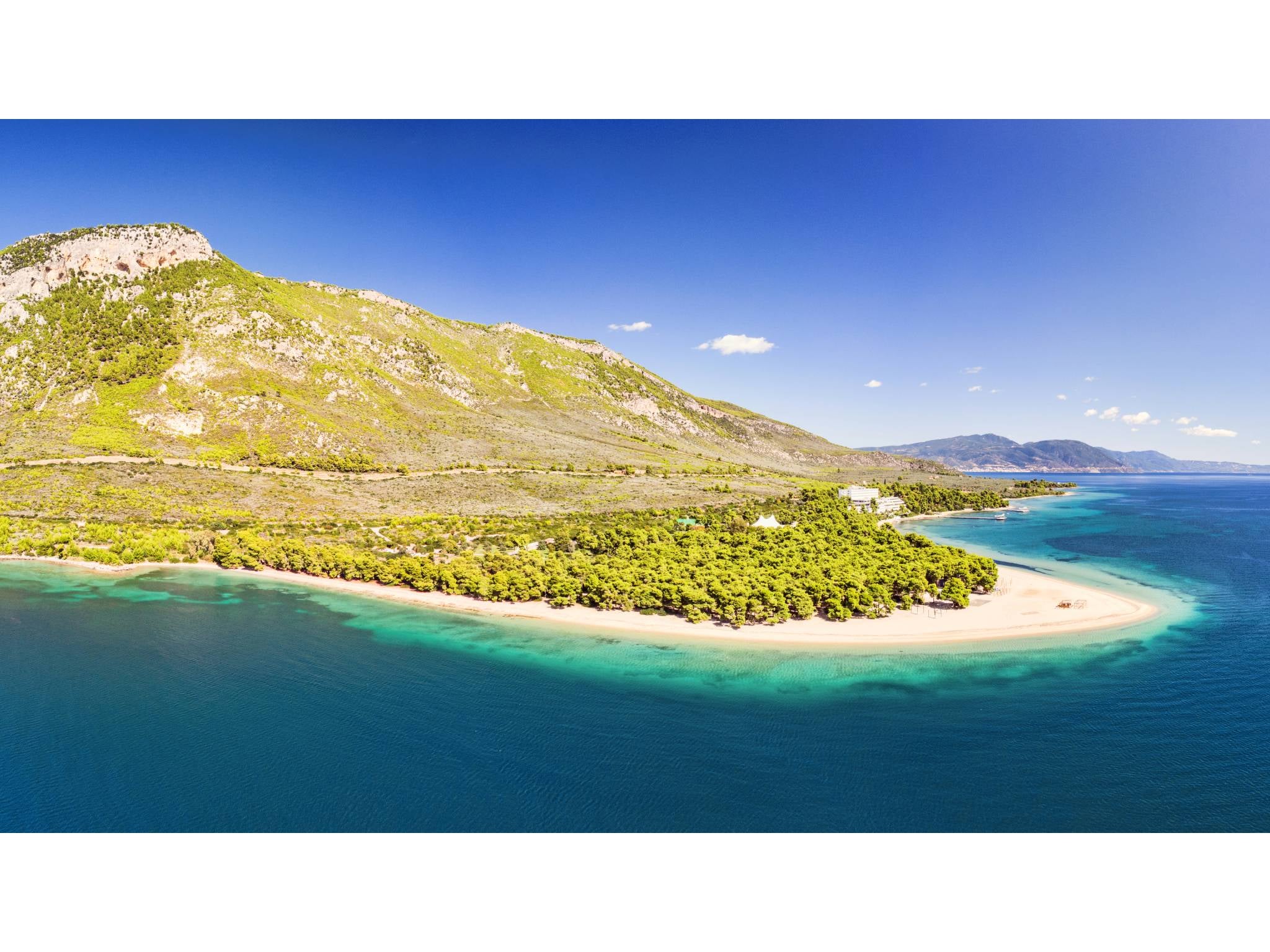 This Greek region is known for its white sand, mountains and pine trees