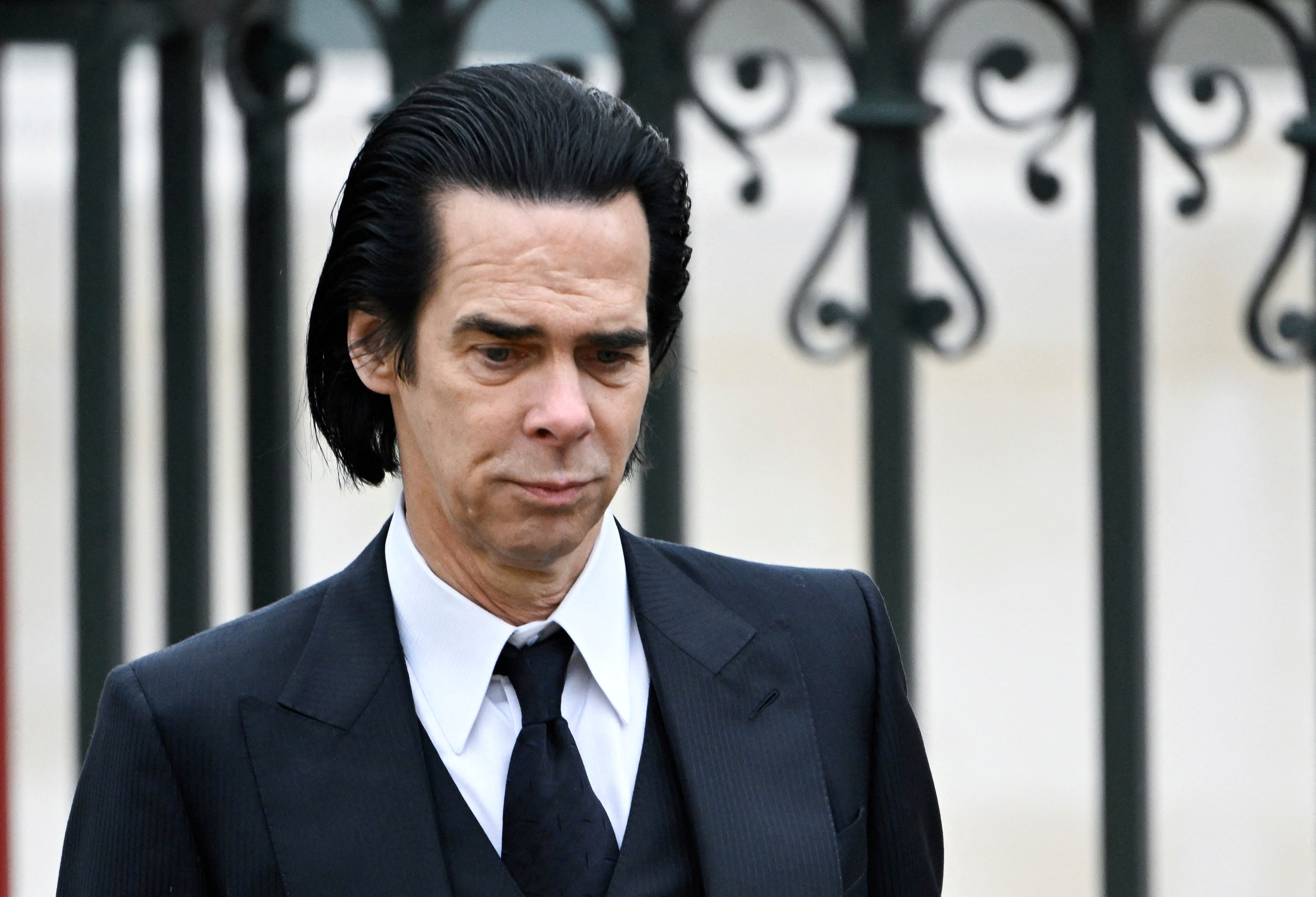 Nick Cave attending the coronation of King Charles III in May 2023