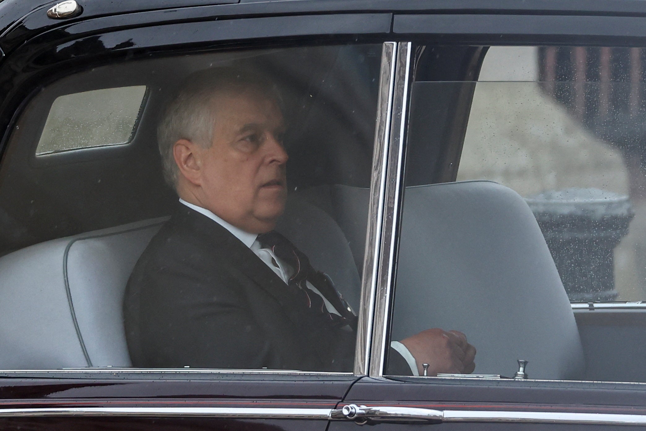 Prince Andrew was booed by some members of the crowd as he was driven to the coronation