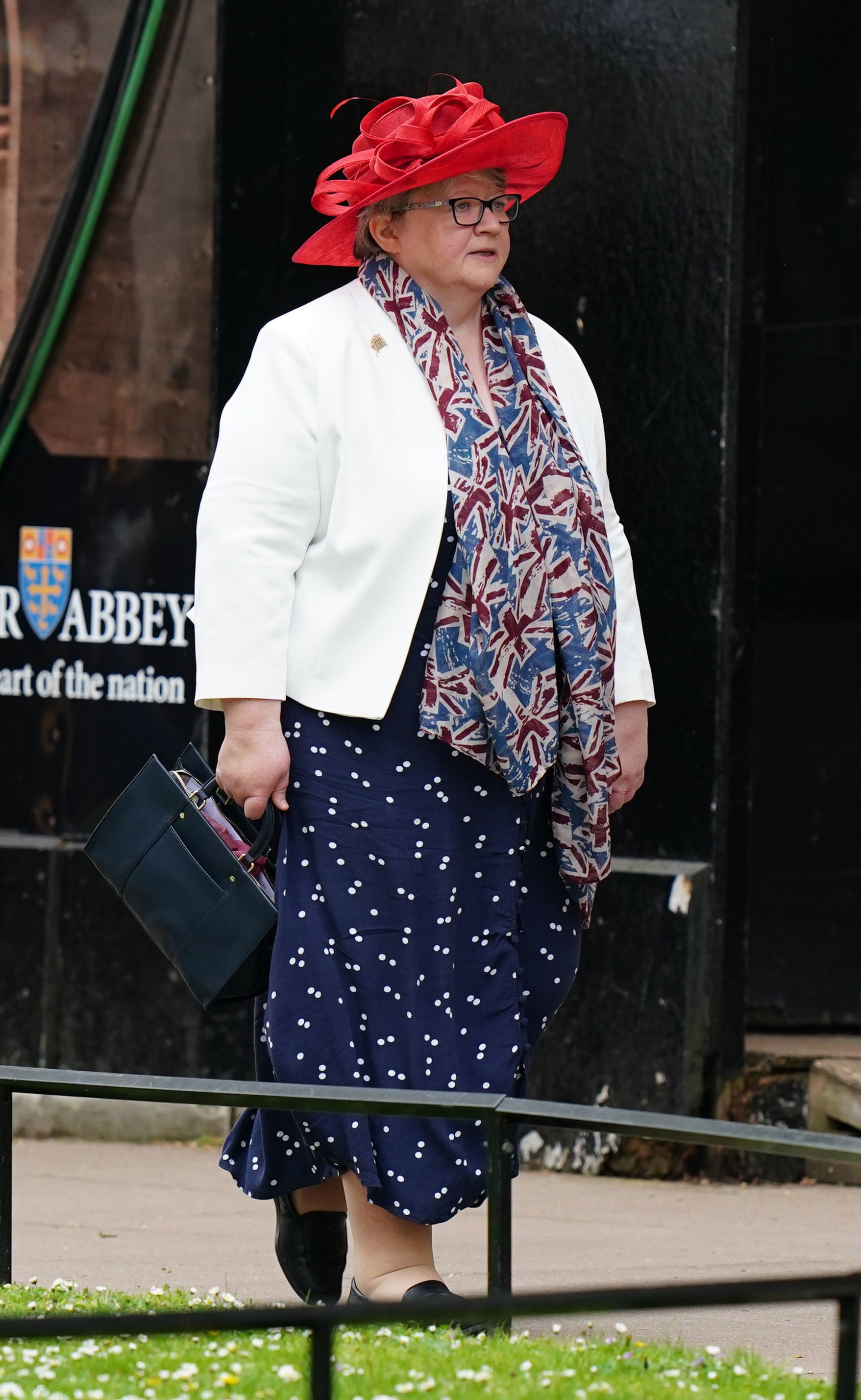 Therese Coffey walks to Westminster Abbey