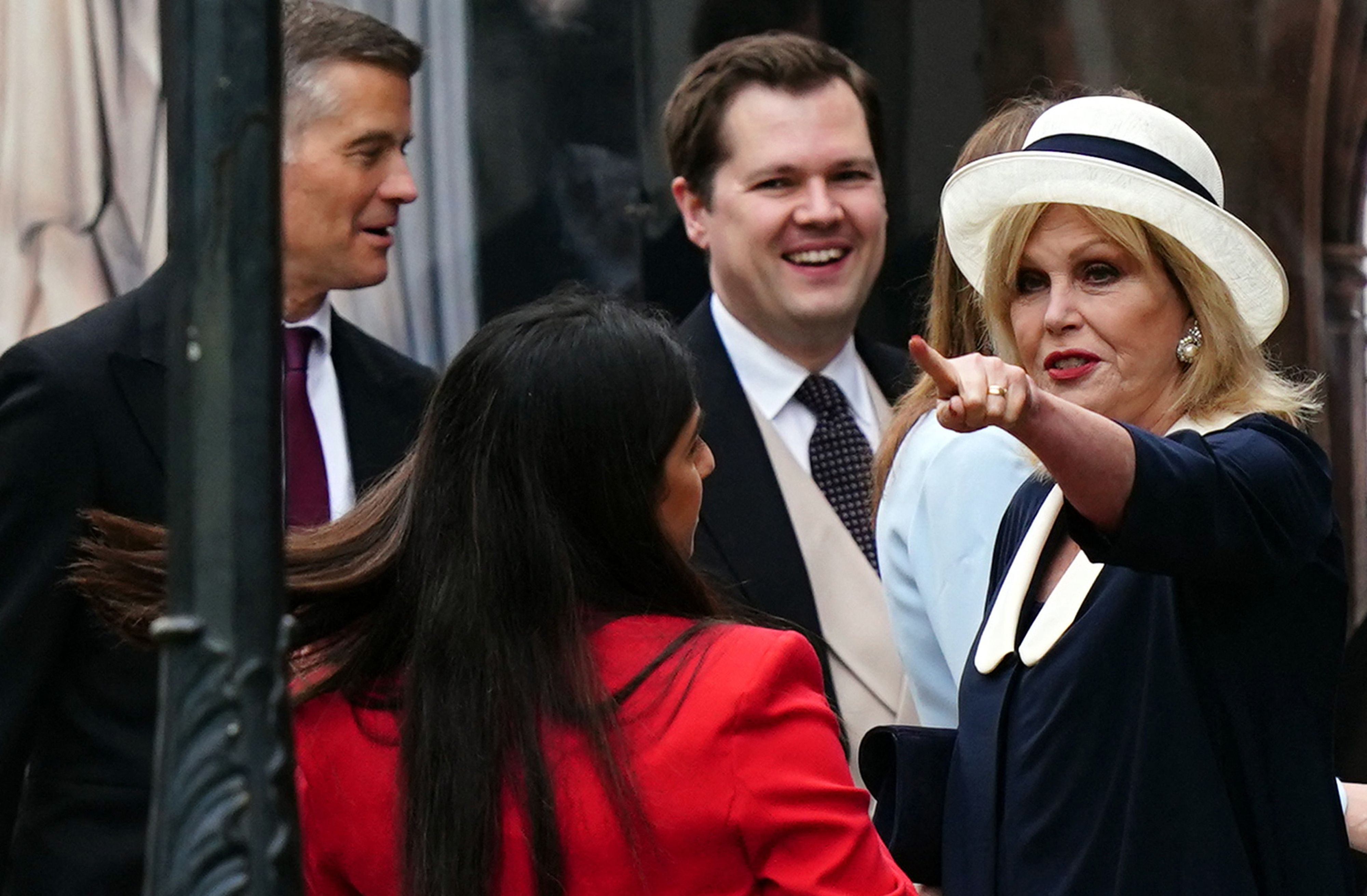 Joanna Lumley, talking with Tory politicians outside the abbey before heading inside for the coronation