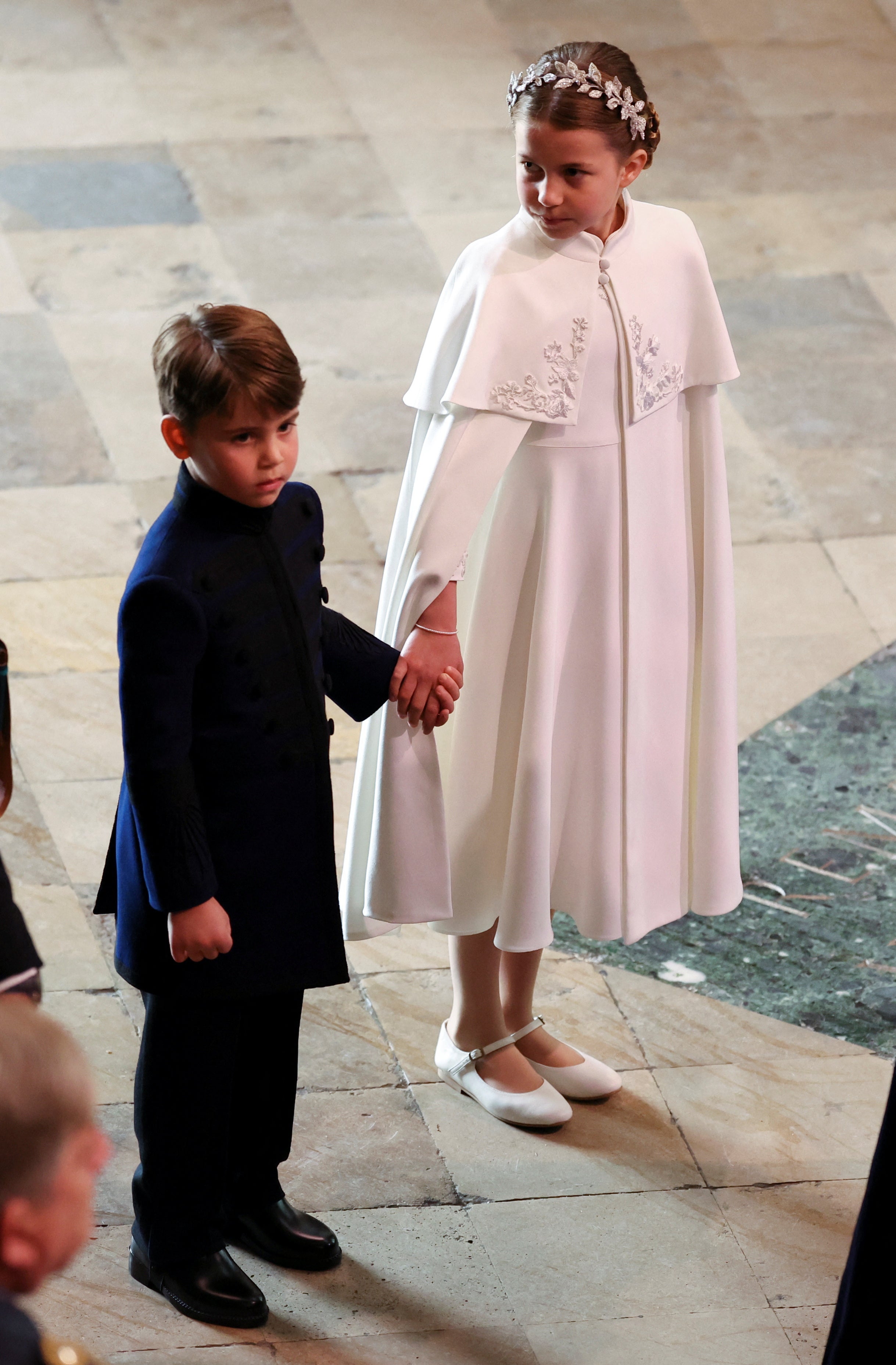 Princess Charlotte wore an ivory outfit almost identical to her mothers