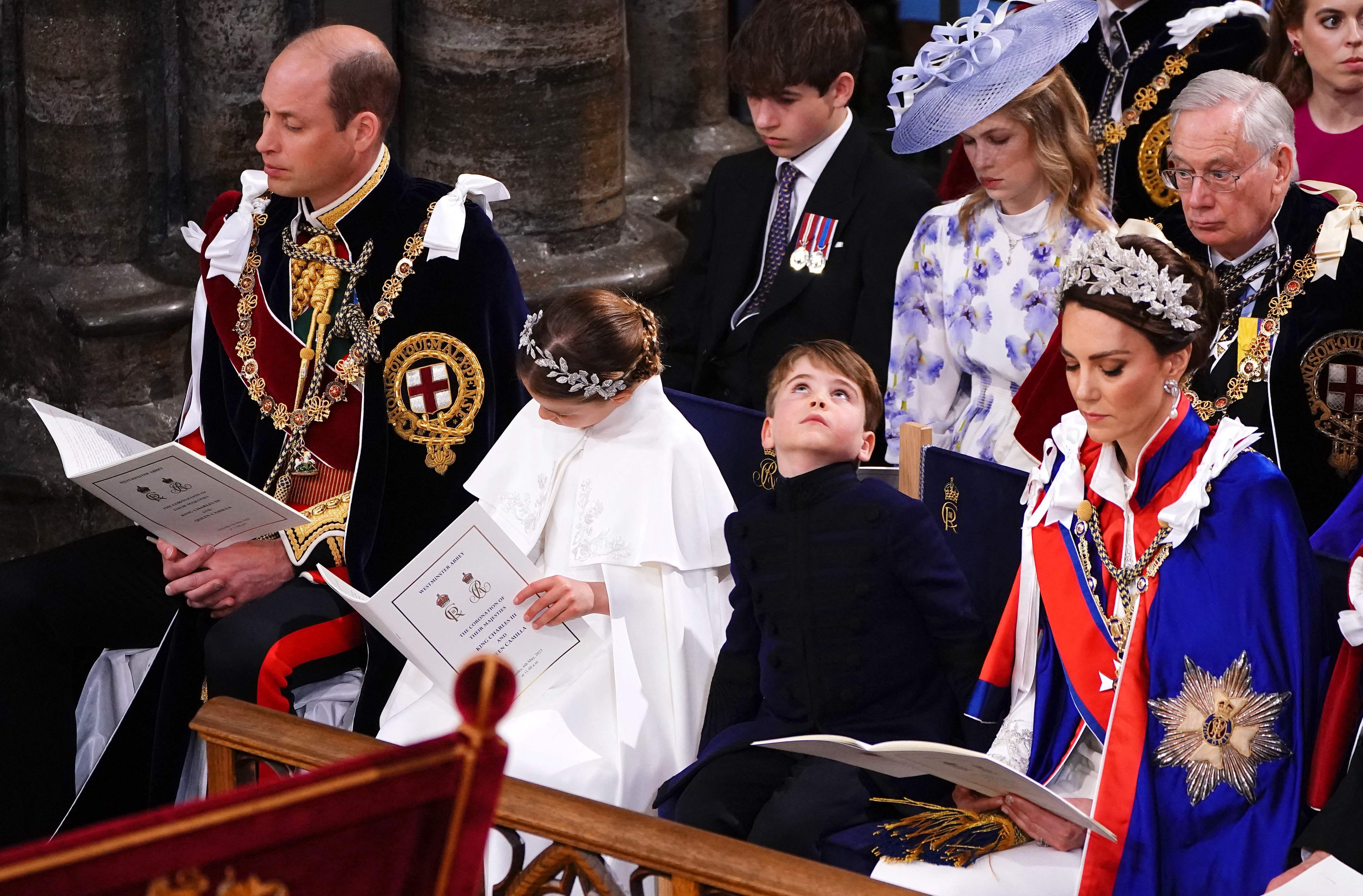 Inside the Abbey, Prince Louis was seen staring towards the ceiling