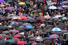 Charles and Camilla weather a soggy coronation: Long may they rain over us