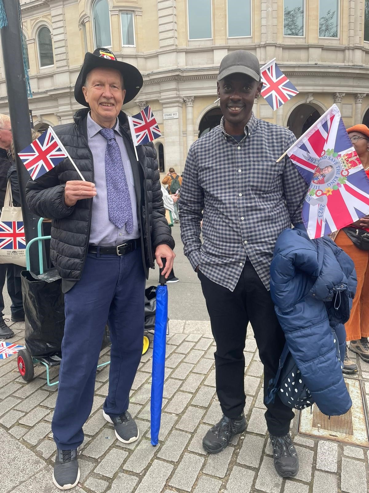 Noel Nuwe (right) flew in from Uganda to celebrate the coronation