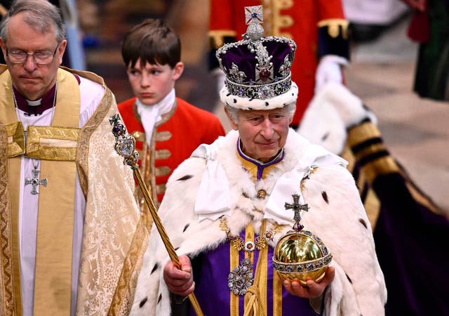 <p>King Charles III departs following his Coronation Ceremony inside Westminster Abbey in central London</p>