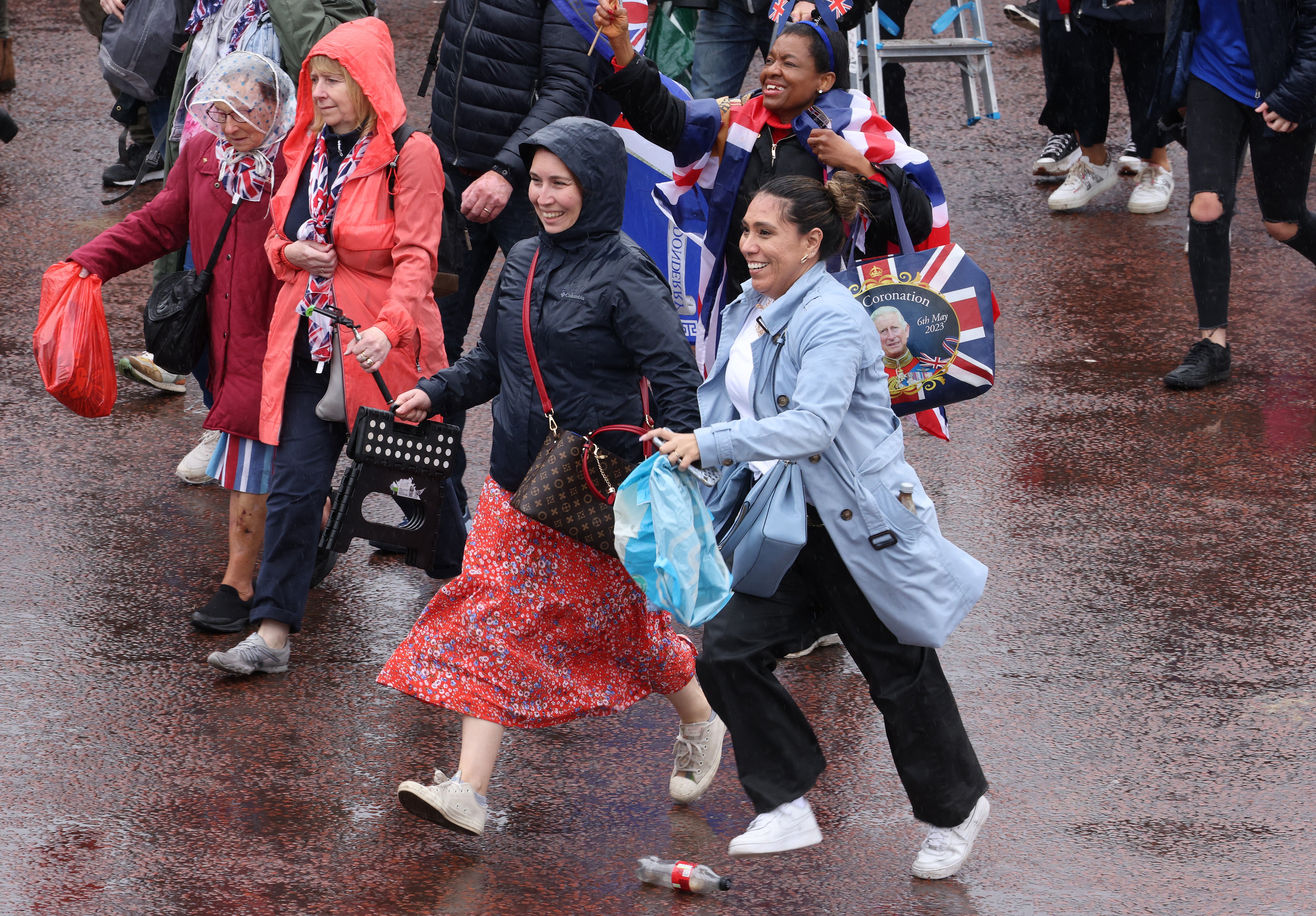 Well wishers make their way up the Mall to see the royal family