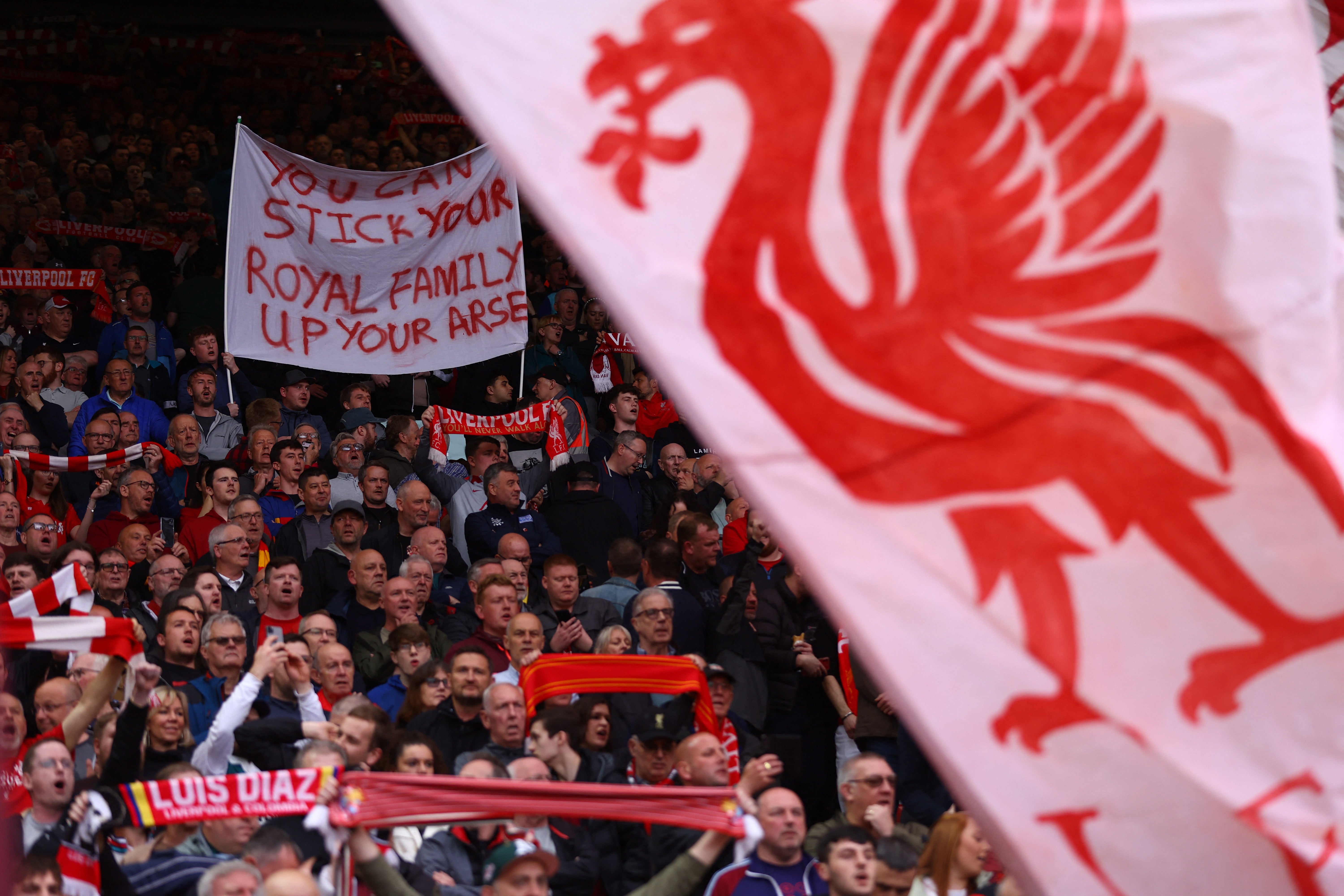 Fans display an anti-royal banner on the day of King Charles III’s coronation