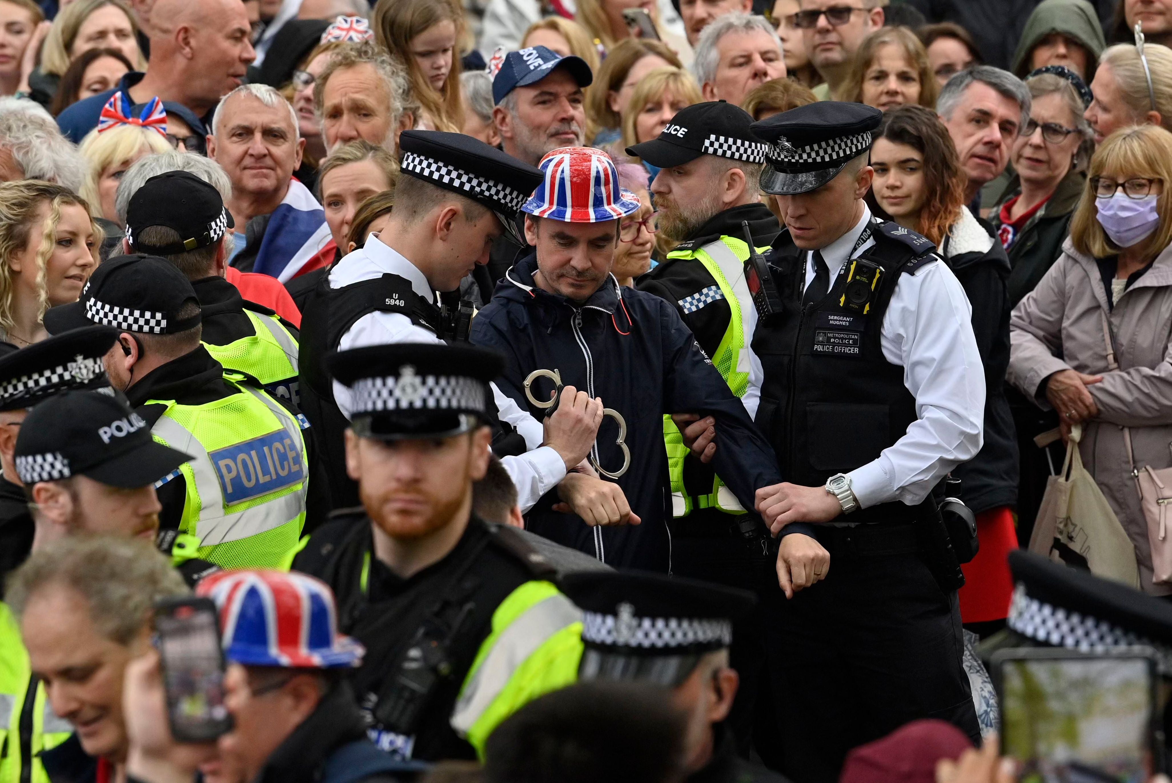 Protesters from ‘Just Stop Oil’ are arrested in the crowd near Westminster Abbey before the ceremony