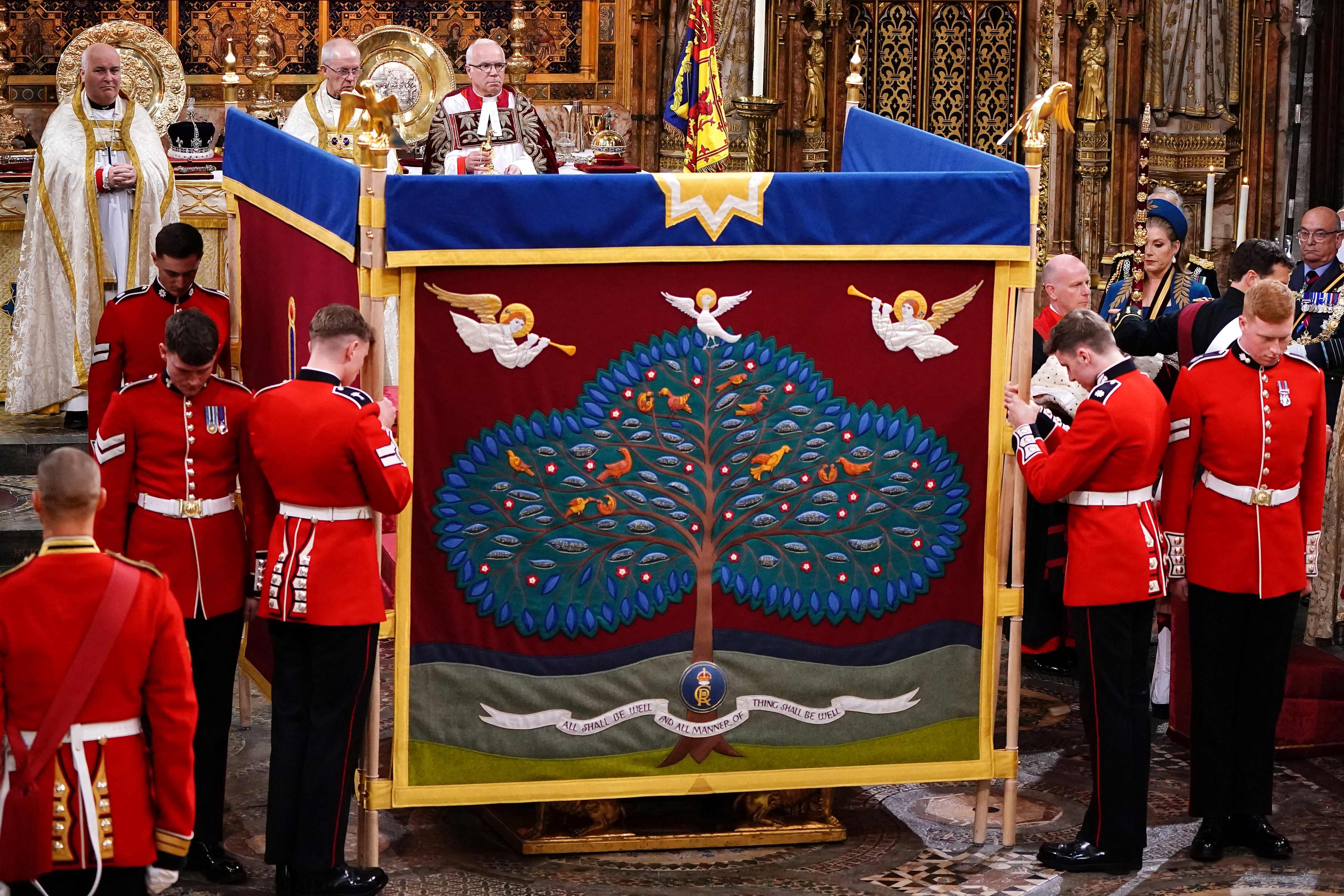 An anointing screen is erected during the ceremony