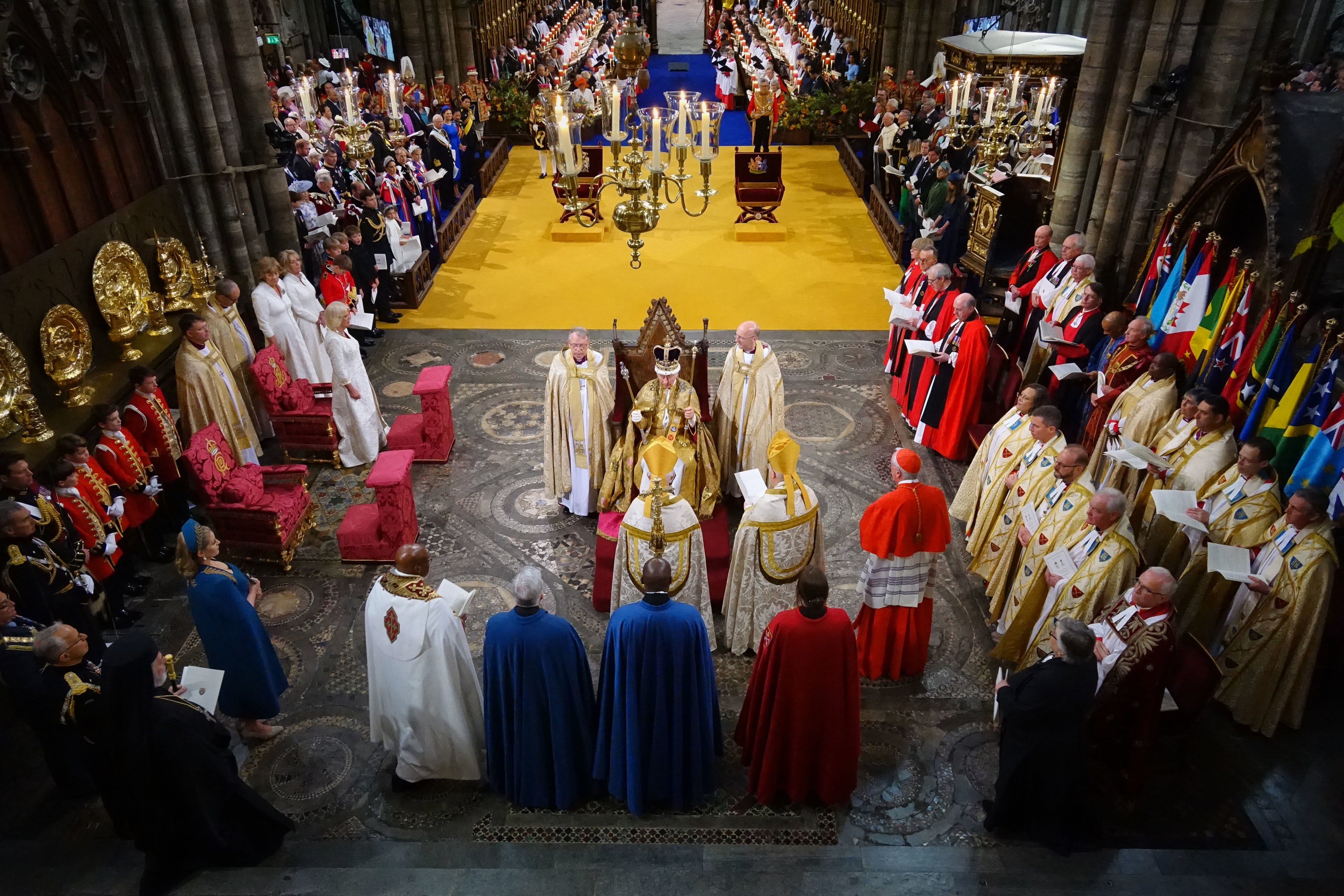 King Charles III after being crowned with St Edward's Crown by The Archbishop of Canterbury