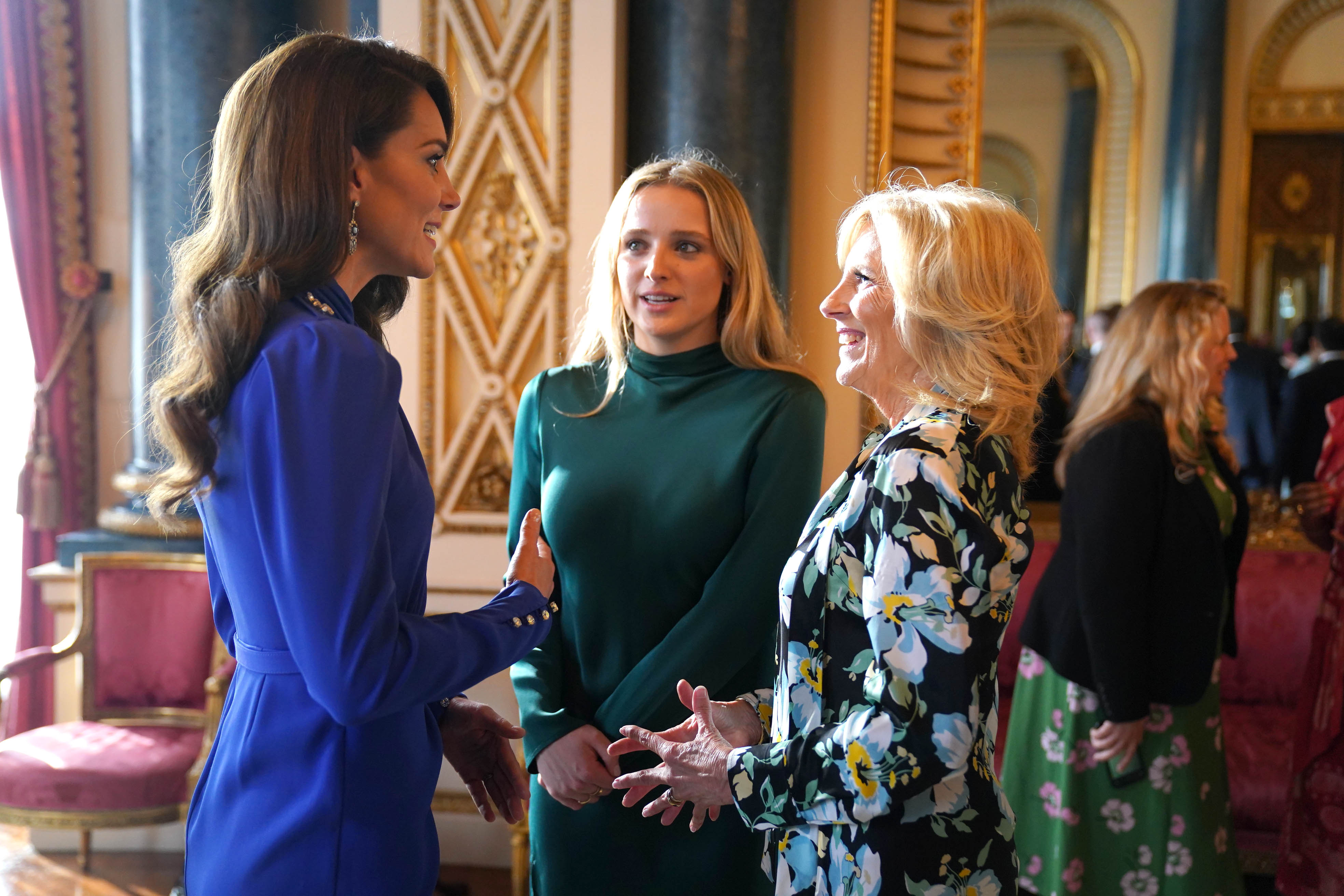 First Lady Jill Biden and her granddaughter, Finnegan Biden, during a reception at Buckingham Palace with the Princess of Wales