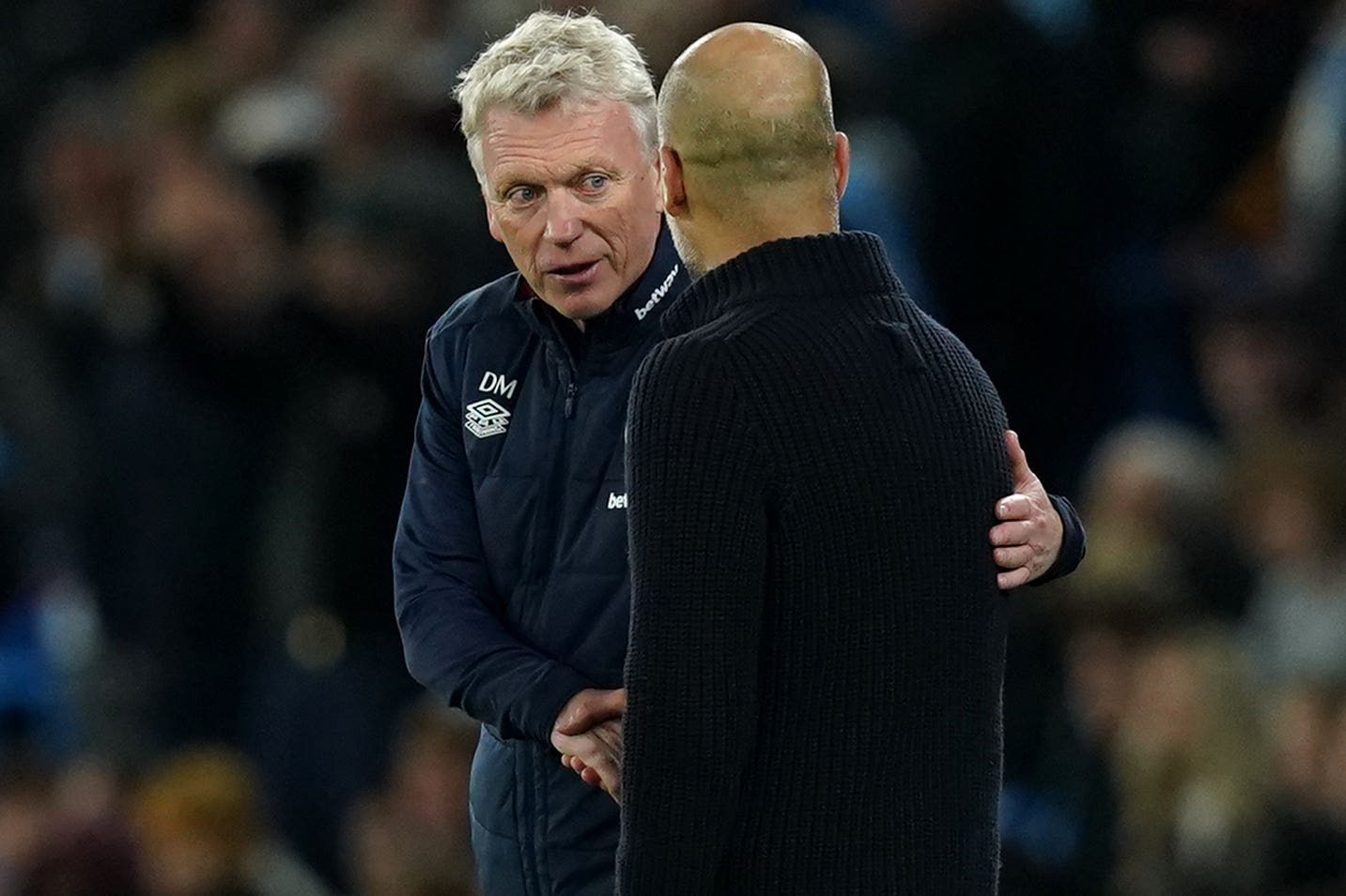 David Moyes congratulates Manchester City manager Pep Guardiola after another defeat (Martin Rickett/PA)