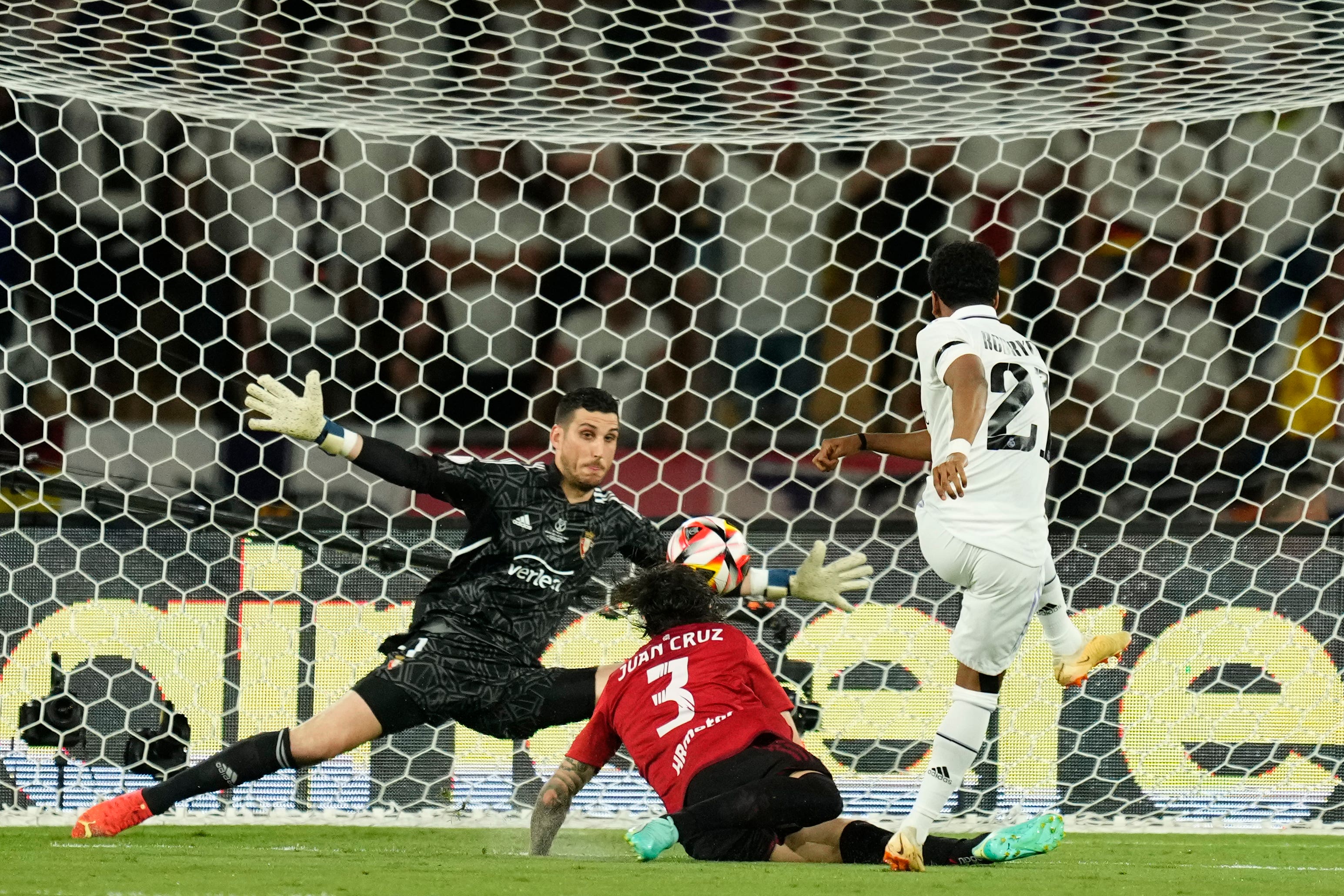 Real Madrid’s Rodrygo, right, fired his side into a second-minute lead in the Copa del Rey final against Osasuna (Jose Breton/AP)