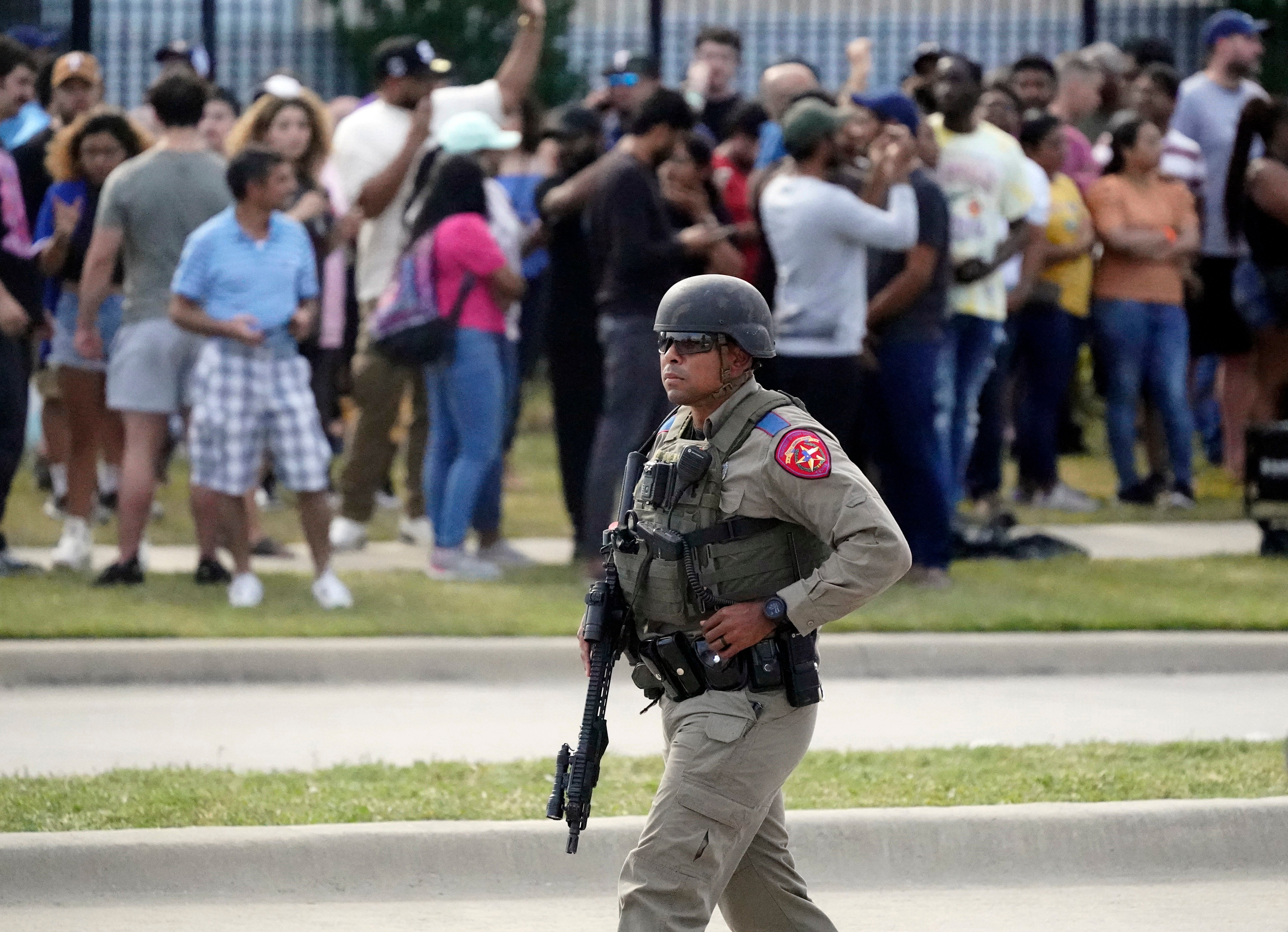 Hundreds of people fled a mall in Allen, Texas, after a gunman opened fire on Saturday