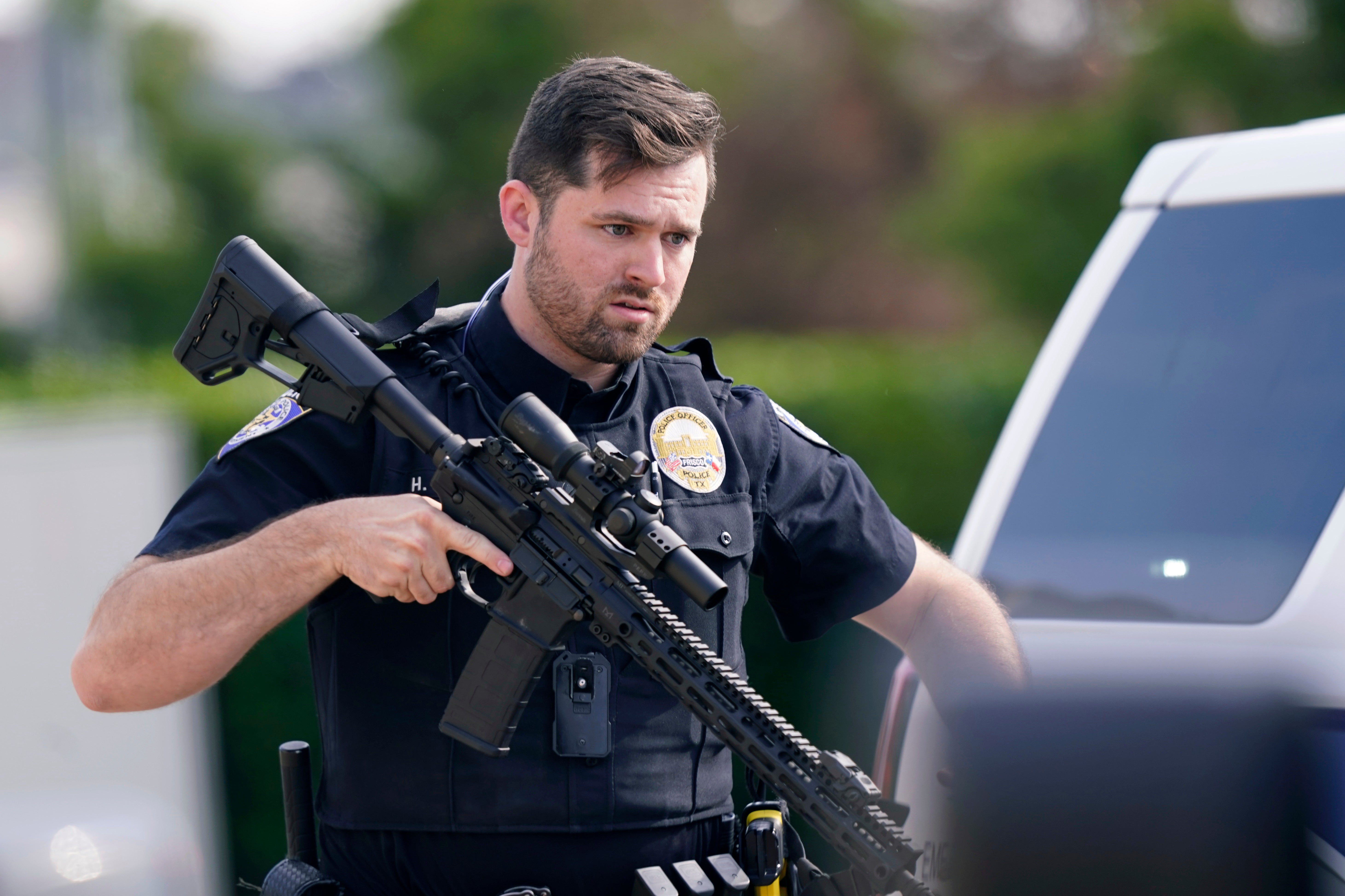 Law enforcement officers at a mall in Allen, Texas, where a gunman killed eight people on Saturday.