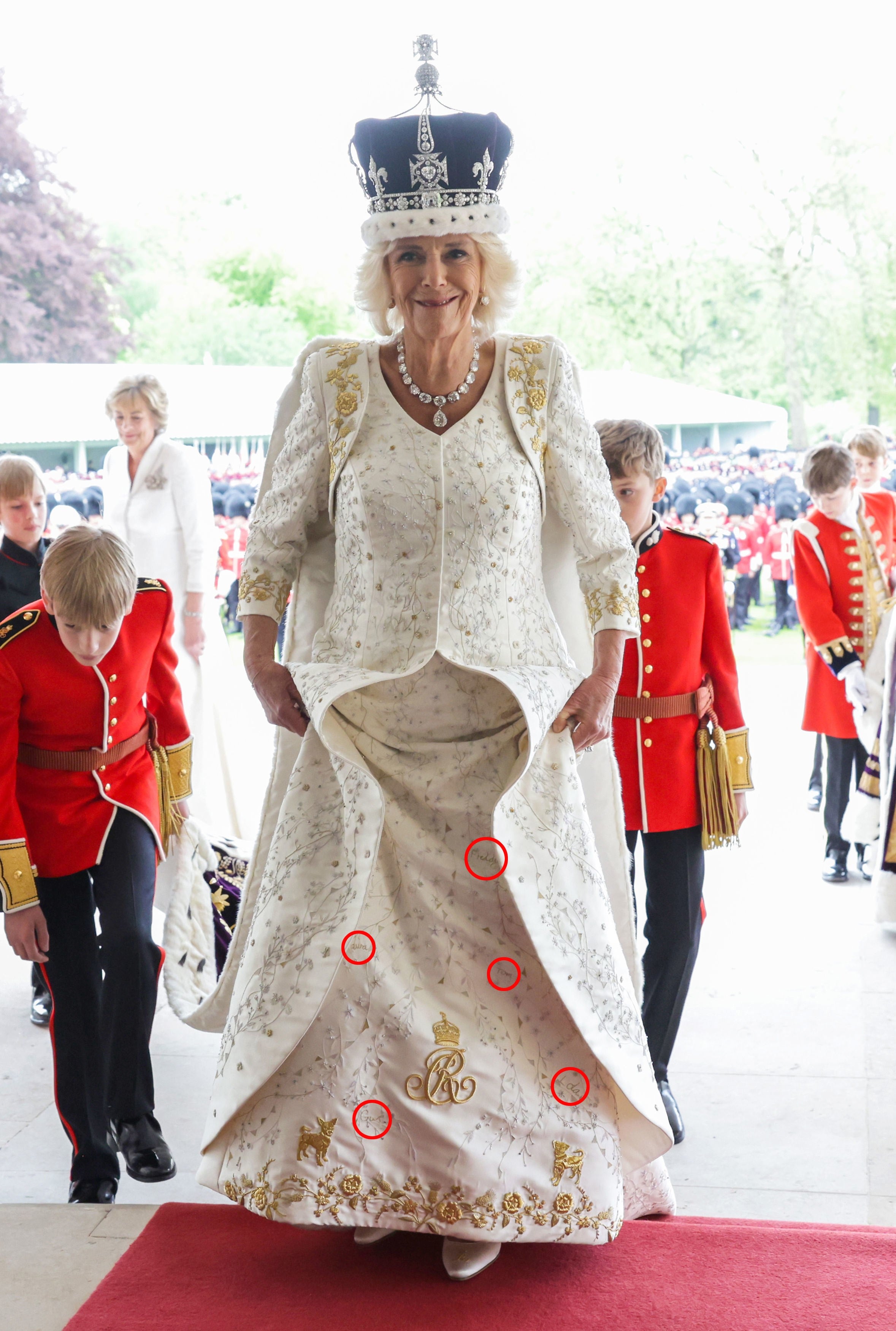 The dress appeared to reveal the names of Camilla’s two children, Tom and Laura, along with those of her grandchildren