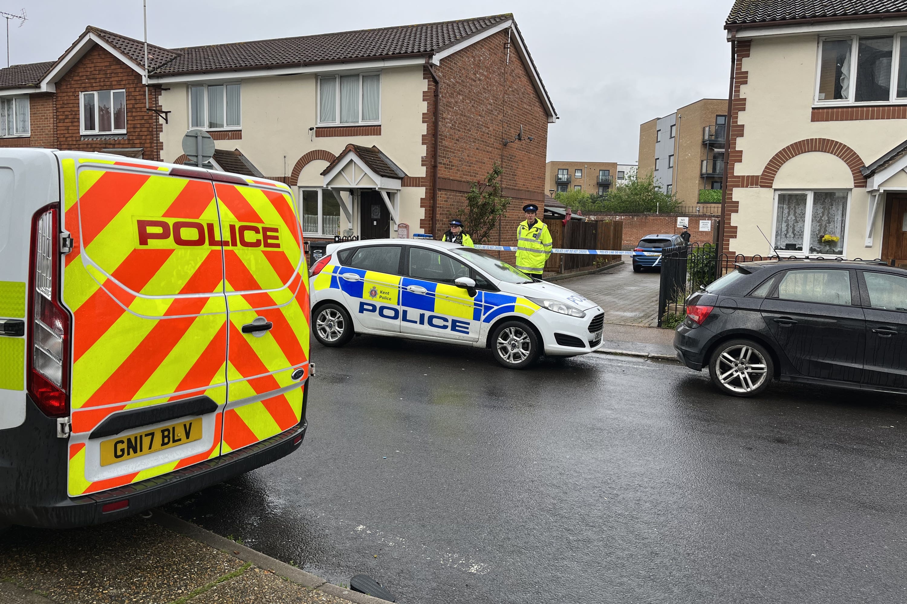 Police officers at the scene in Priory Road (Joseph Draper/PA)