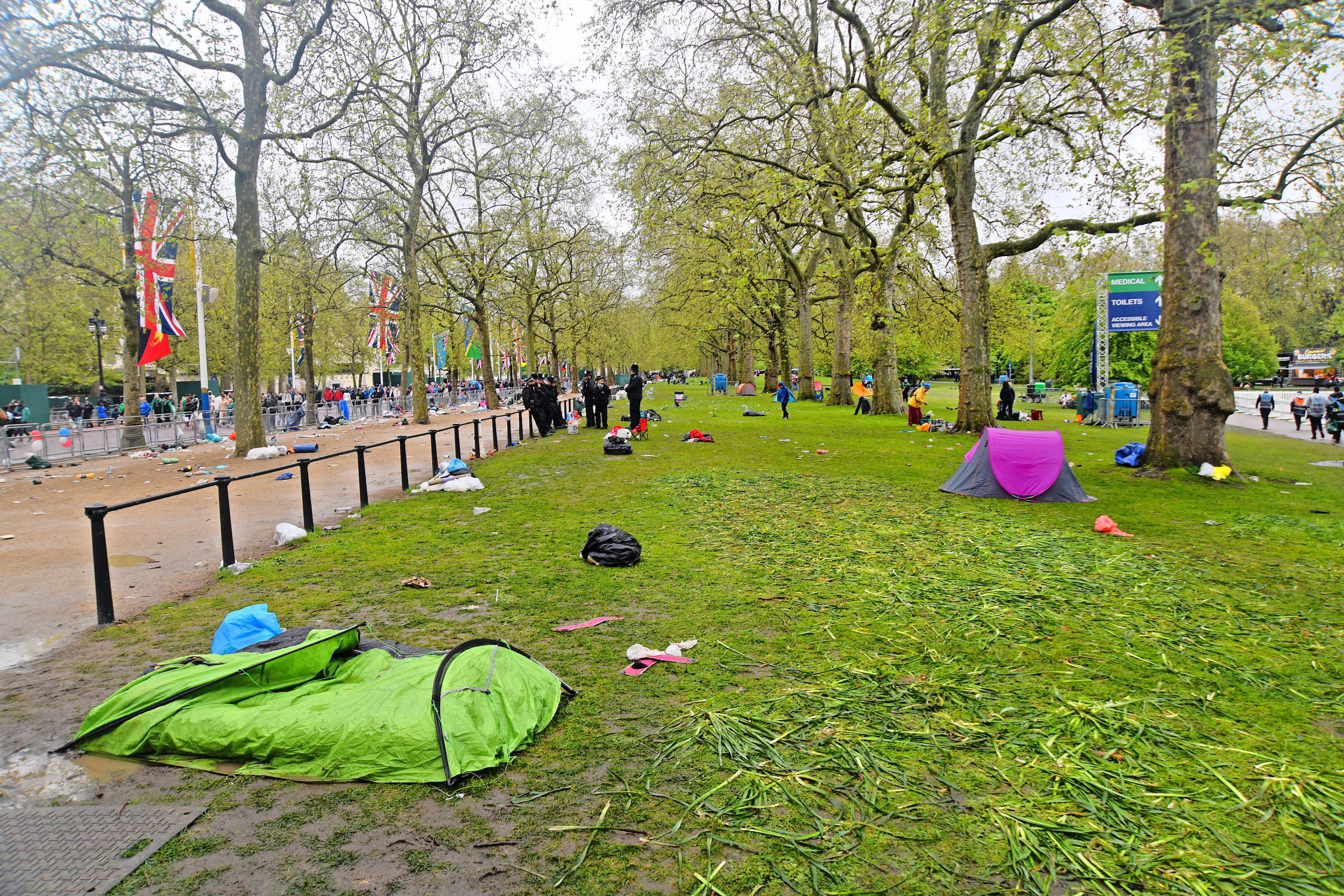 Discarded tents belonging to royal fans who camped out for the coronation