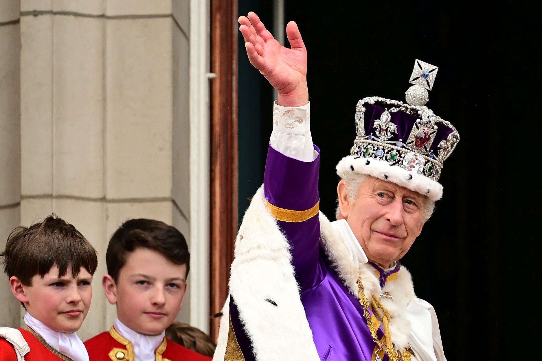 The King on the balcony (Leon Neal/PA)