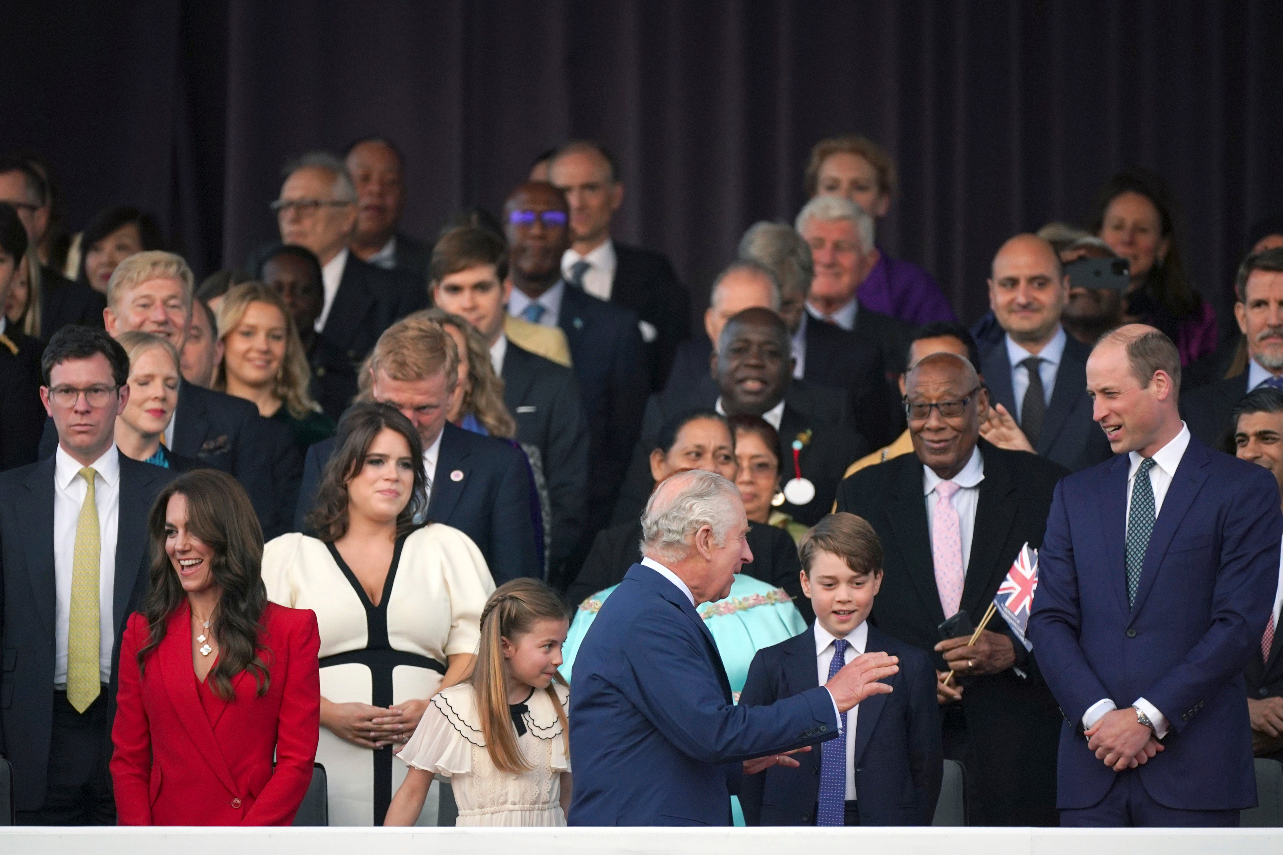 Three generations of royals share a moment in the crowd