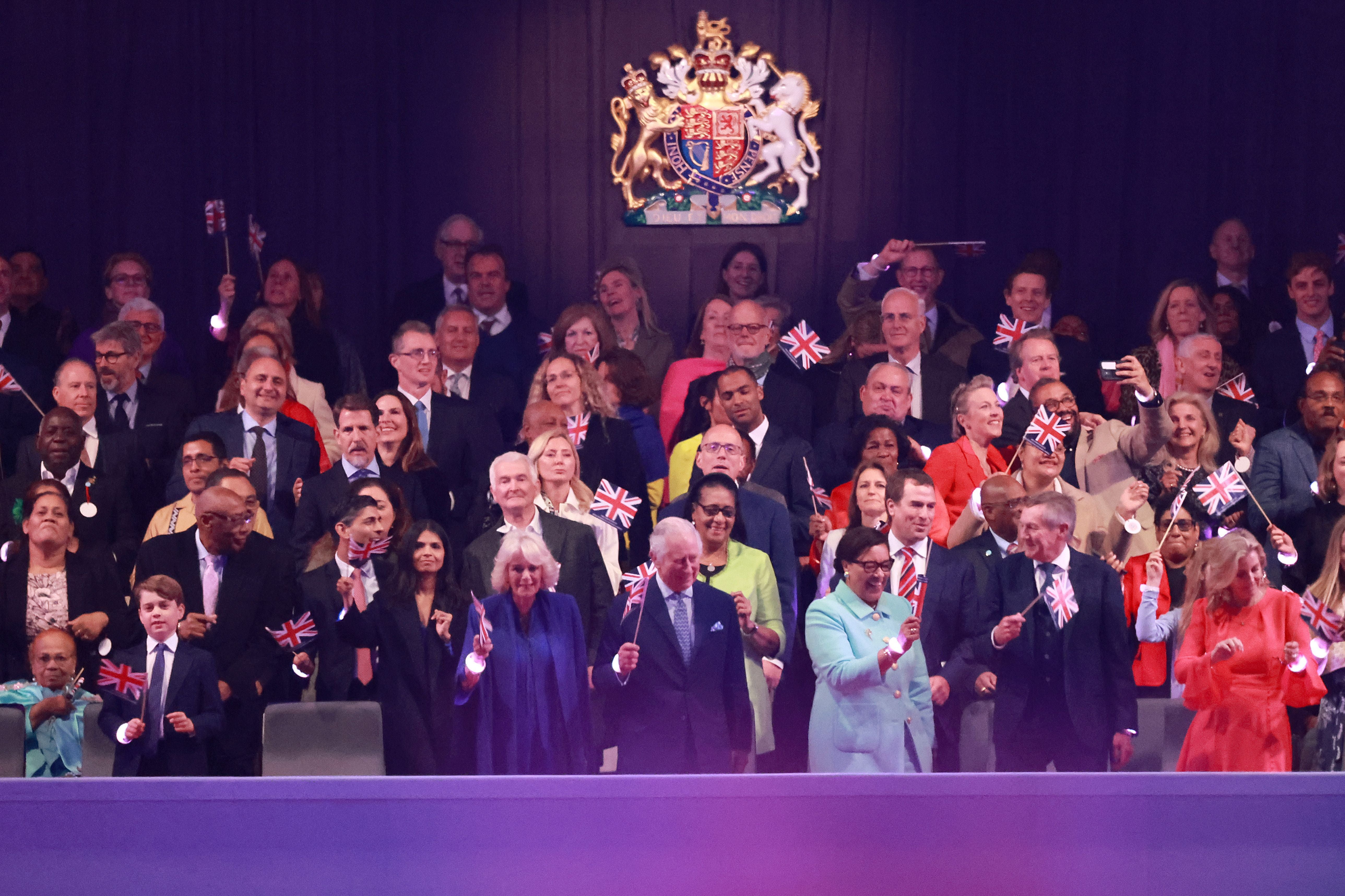 King Charles III, Queen Camilla, Prince George of Wales, Rishi Sunak, Akshata Murty and Baroness Scotland enjoying the Coronation Concert at Windsor Castle