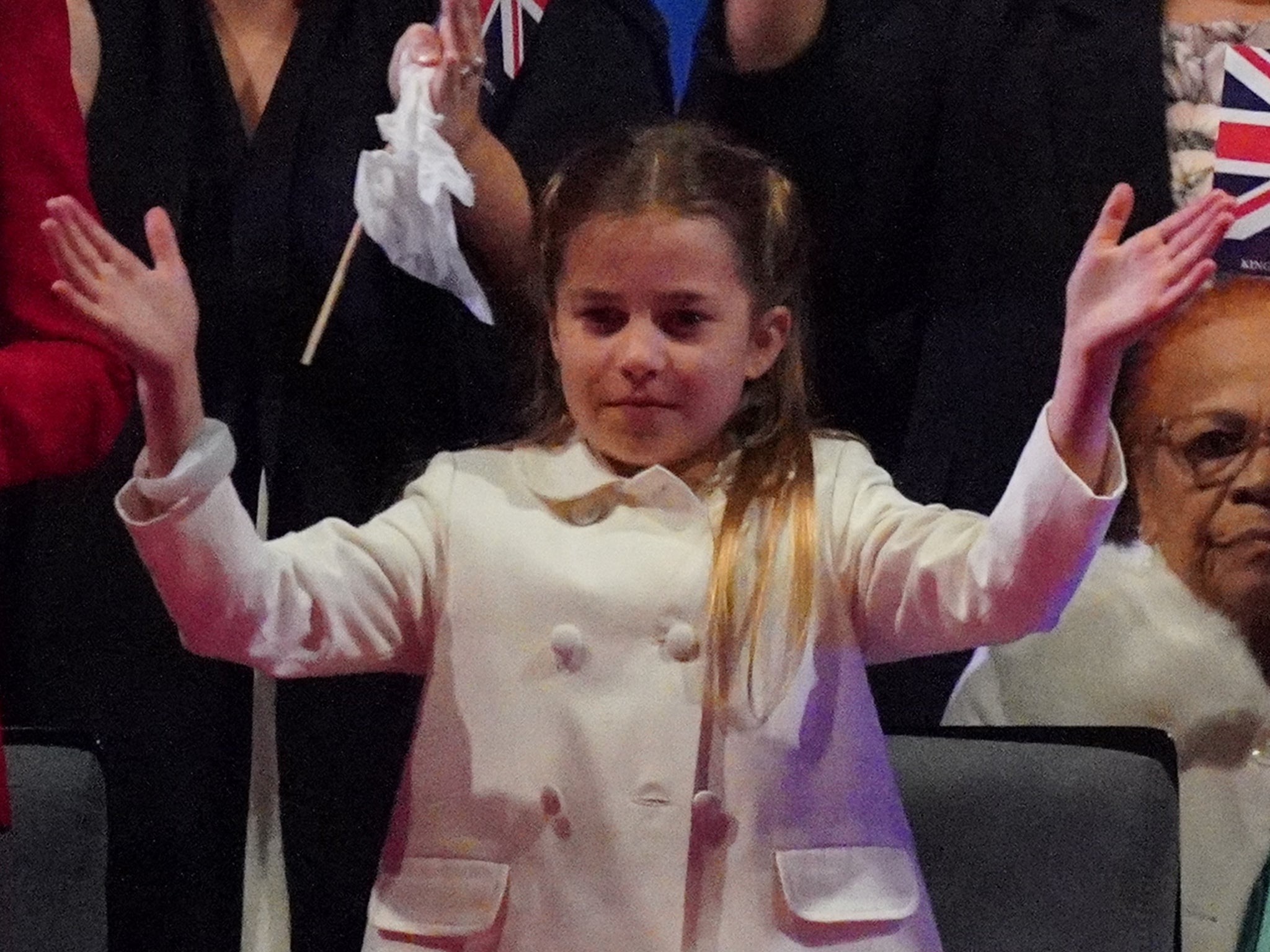 Princess Charlotte seen clapping her hands.