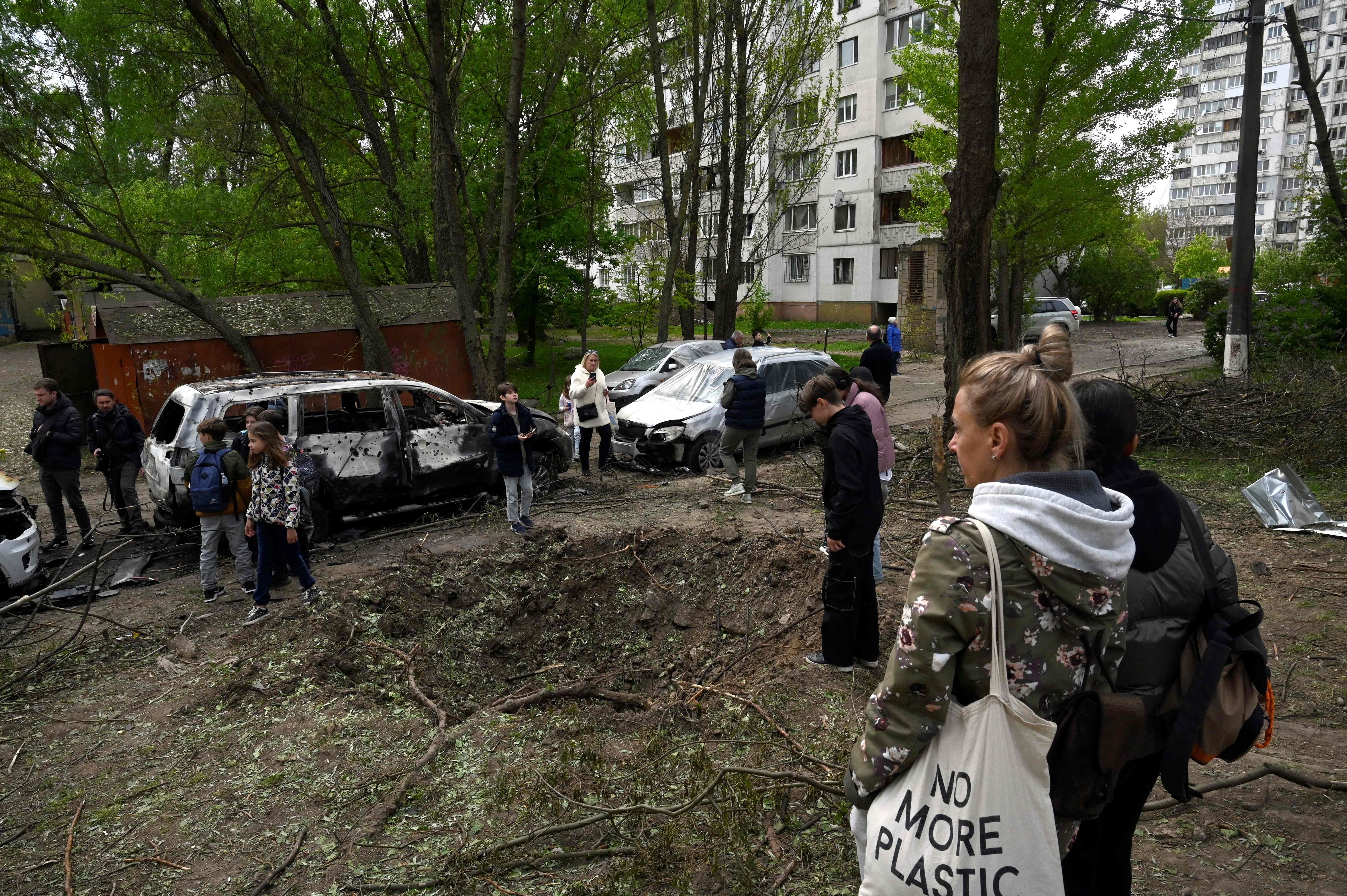 A crater near homes in Kyiv caused by a Russian drone