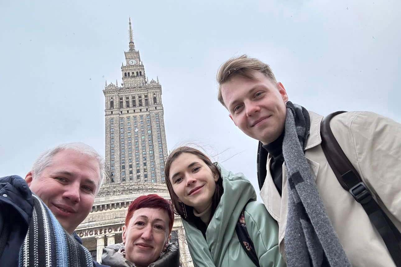 Tim Johnson, far left, and volunteers in Warsaw (Tim Johnson/PA)