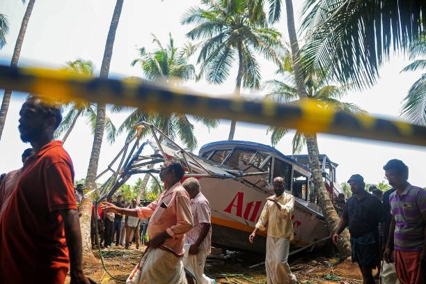 Onlookers gather near the site of a boat accident in Tanur, in Malappuram district on 8 May 2023