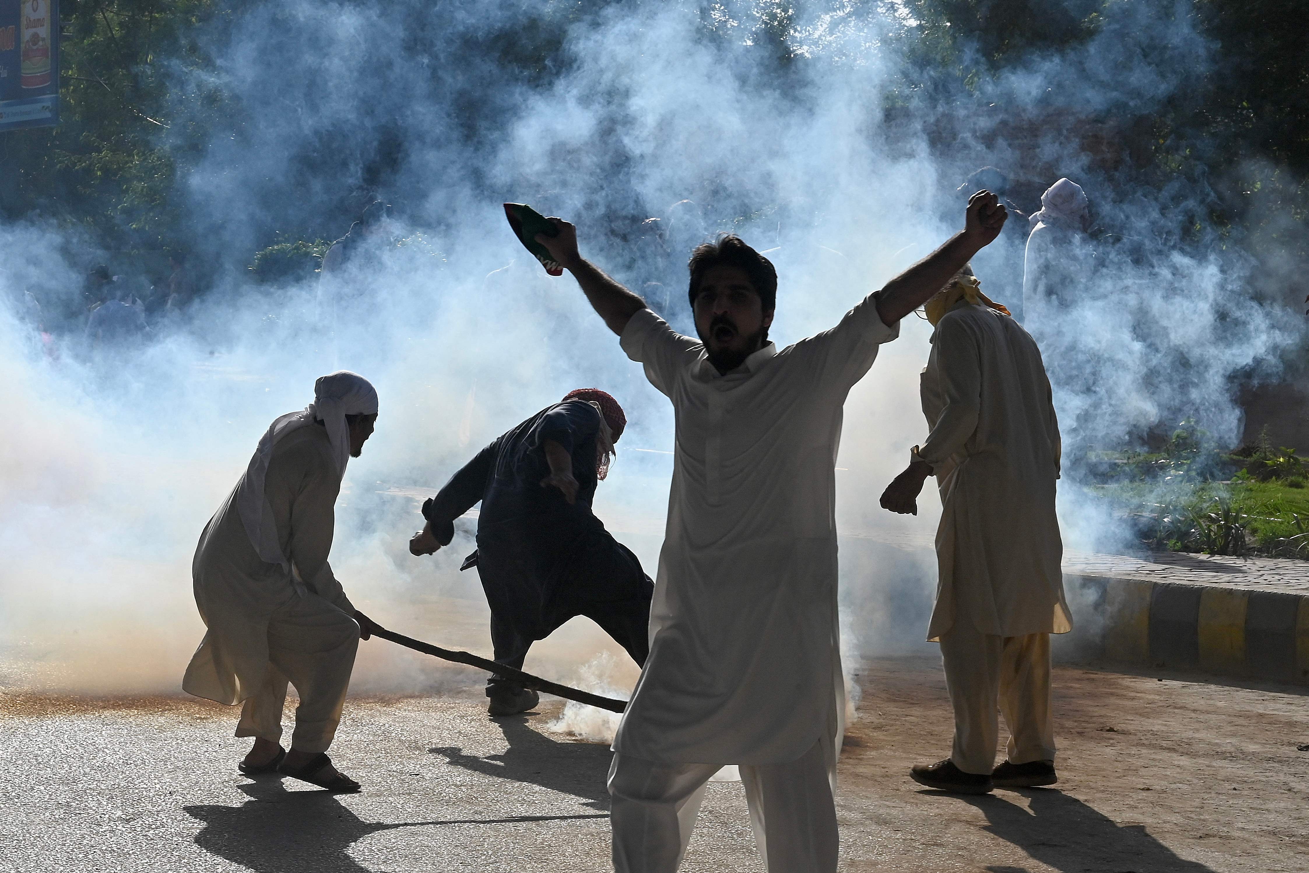 Pakistan Tehreek-e-Insaf (PTI) party activists in Peshawar protest against Imran Khan’s arrest