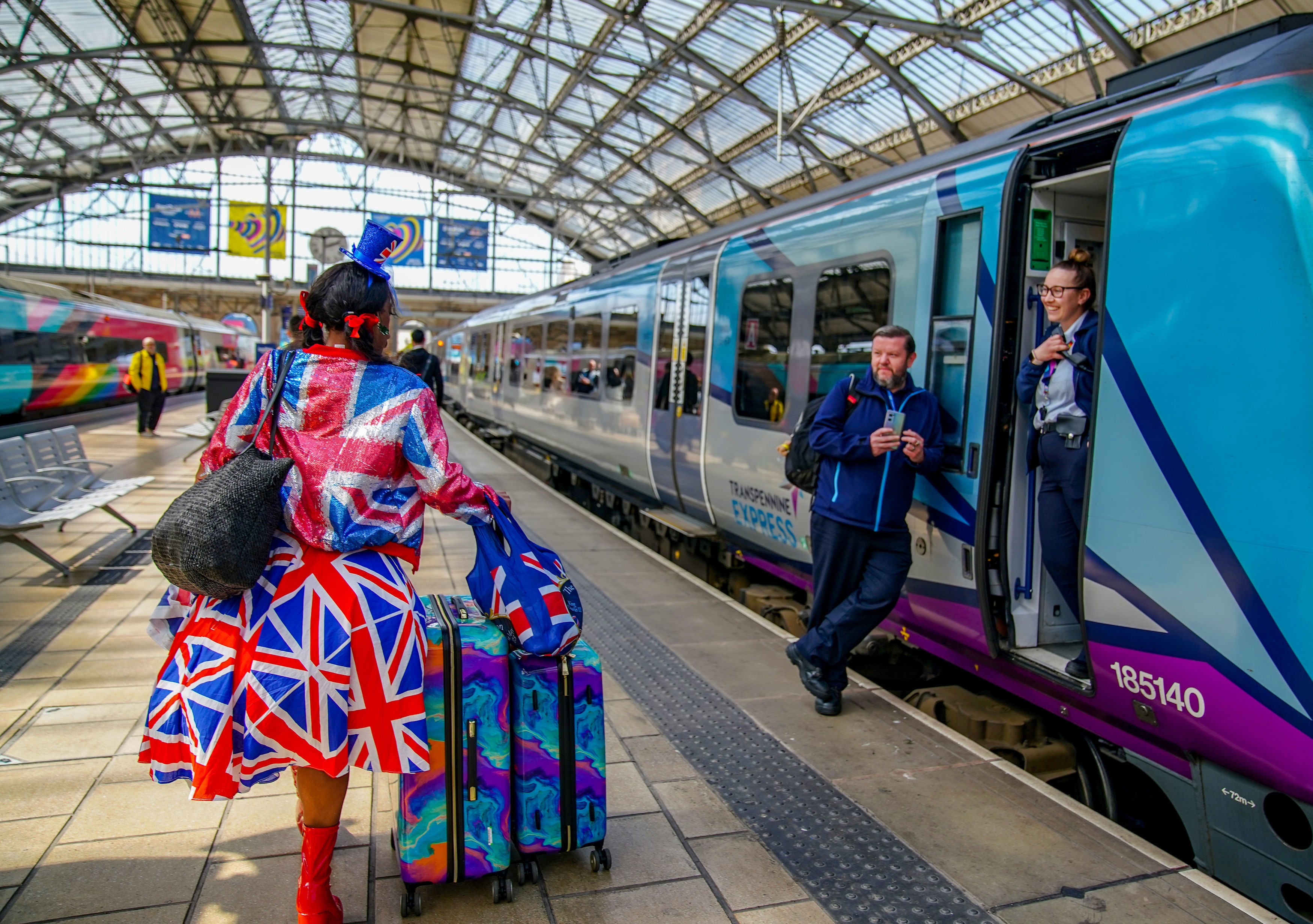 Two trains carrying 170 Eurovision song contest superfans arrive into Liverpool Lime Street train station
